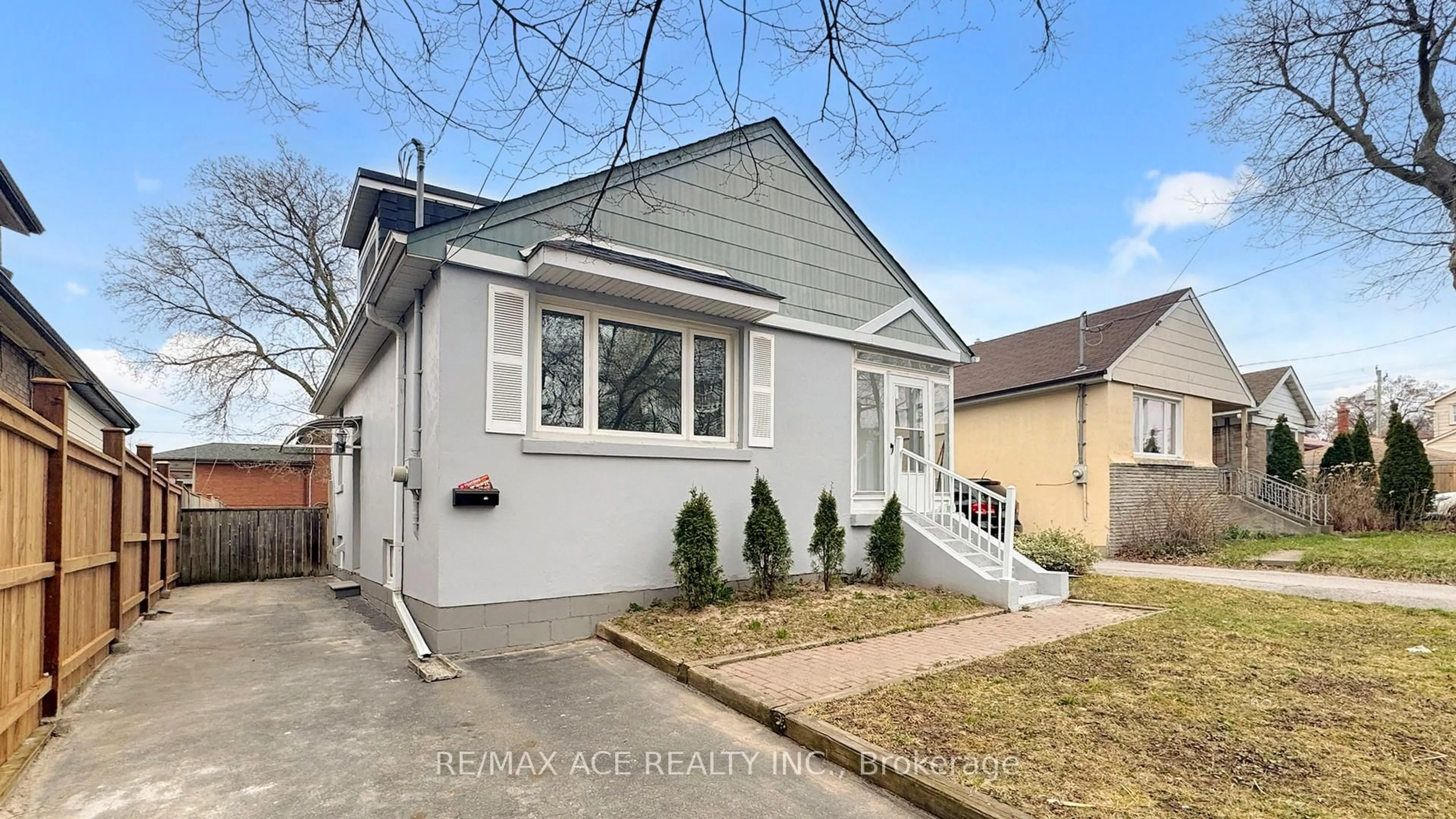 Home with brick exterior material, street for 102 Newport Ave, Toronto Ontario M1L 1J3
