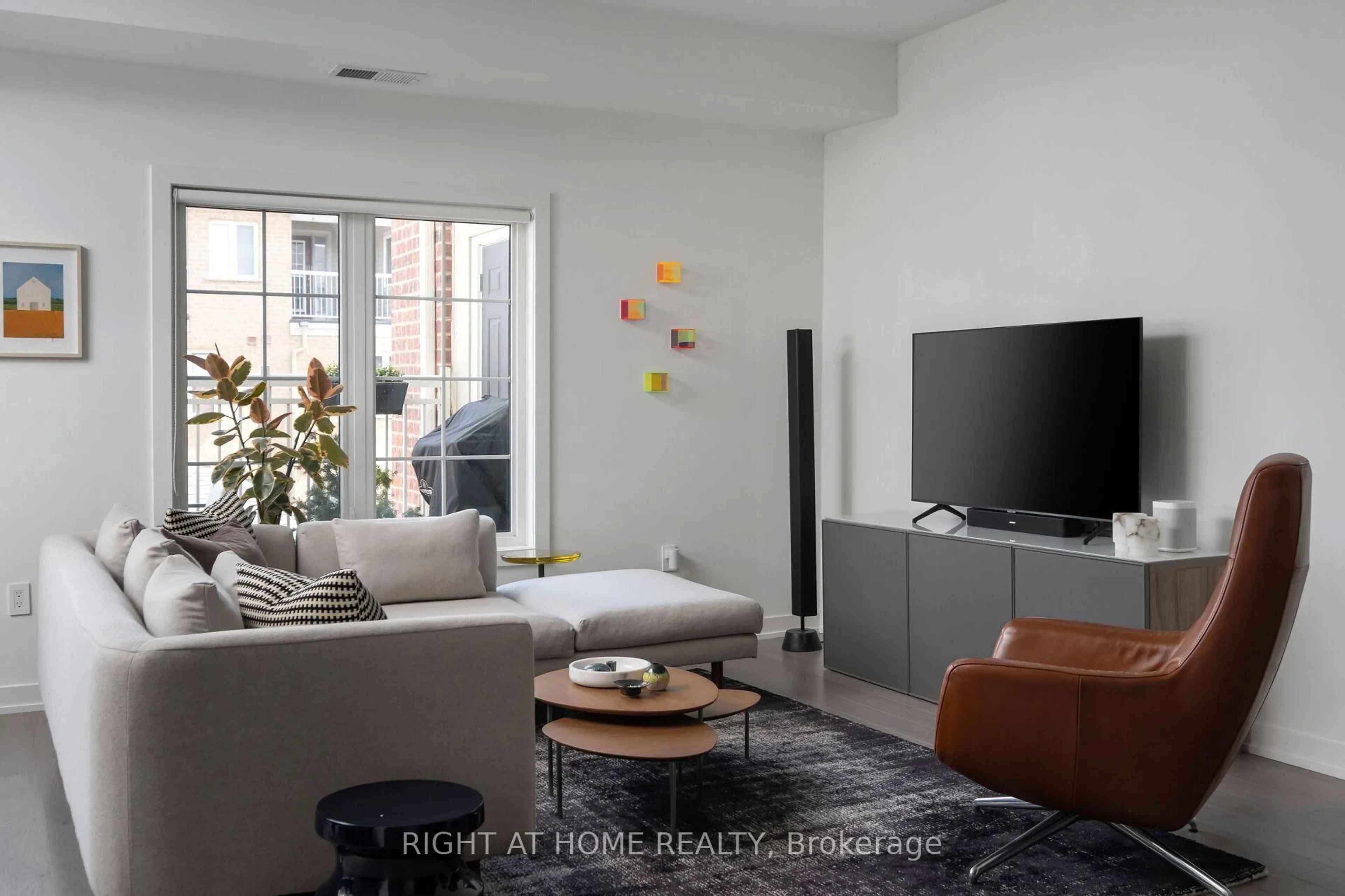 Living room with furniture, unknown for 2320 Gerrard St #118, Toronto Ontario M4E 2E1