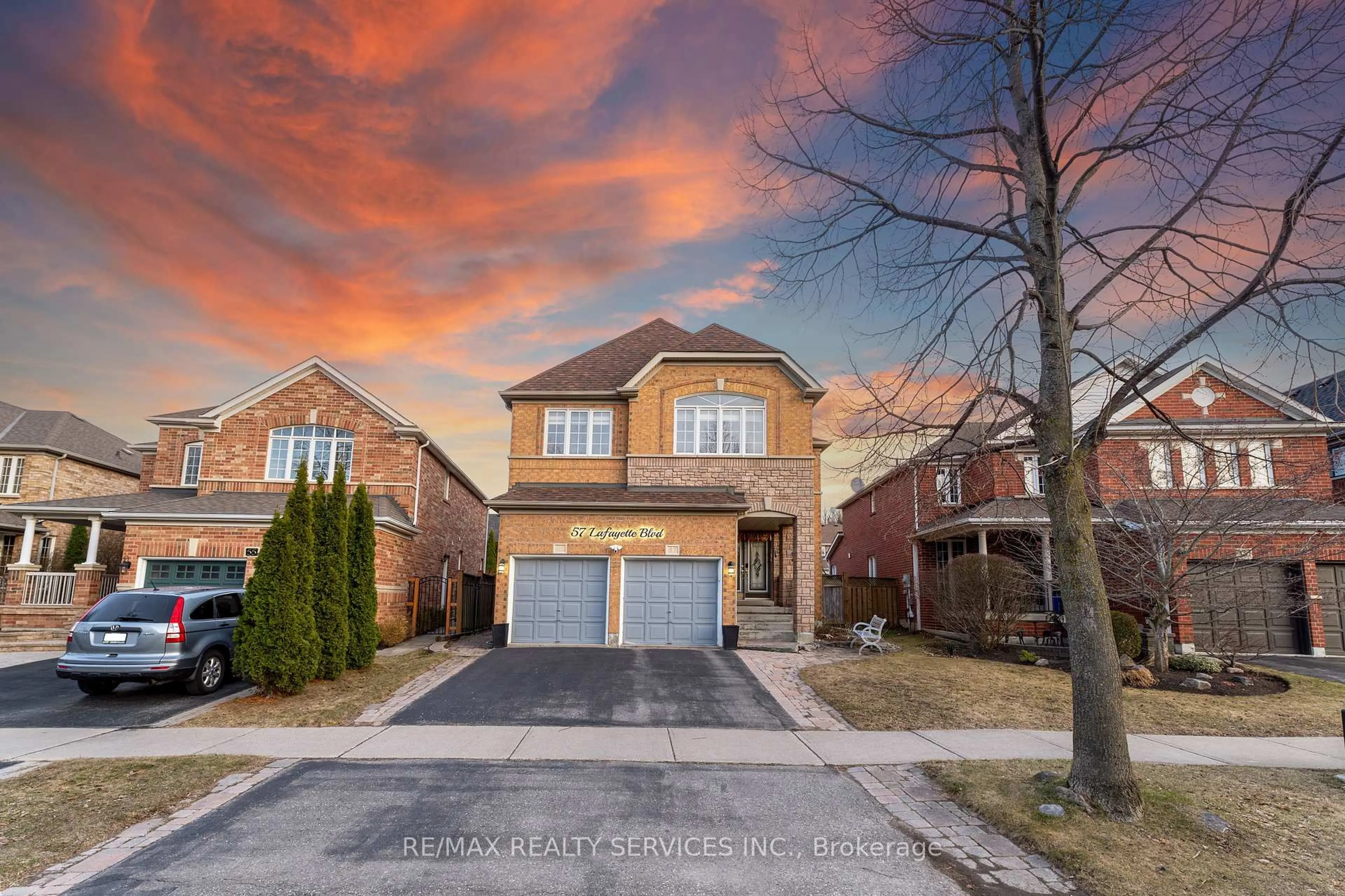 Home with brick exterior material, street for 57 Lafayette Blvd, Whitby Ontario L1P 1T2