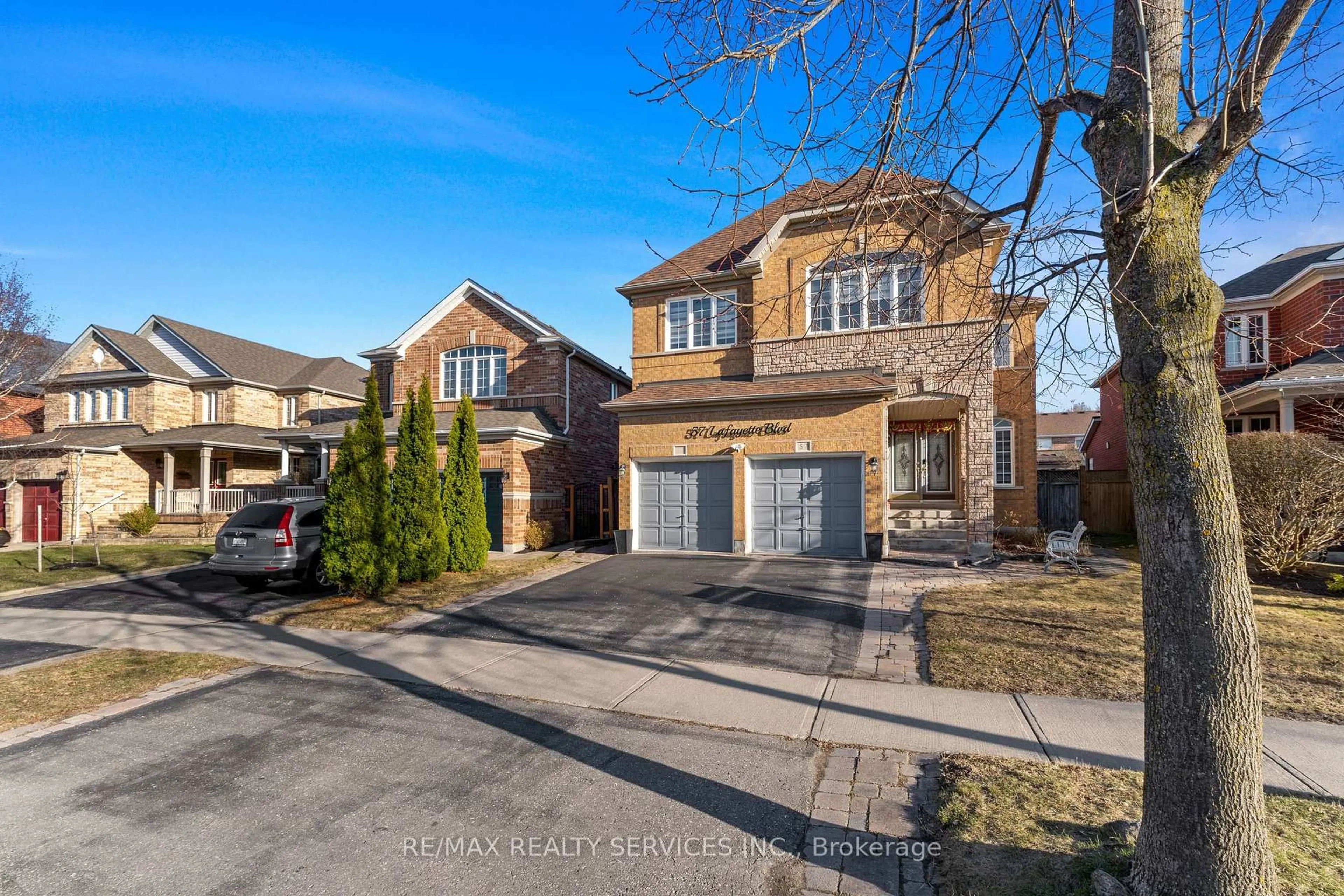 Home with brick exterior material, street for 57 Lafayette Blvd, Whitby Ontario L1P 1T2