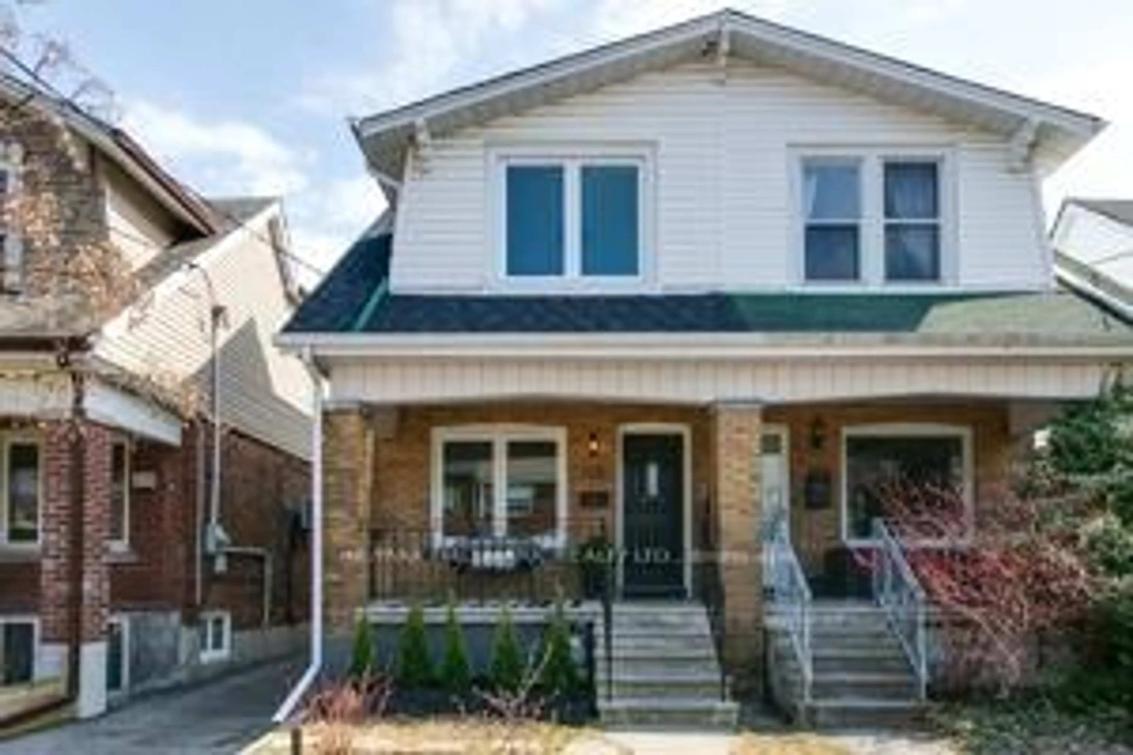 Home with brick exterior material, street for 105 Queensdale Ave, Toronto Ontario M4J 1Y2