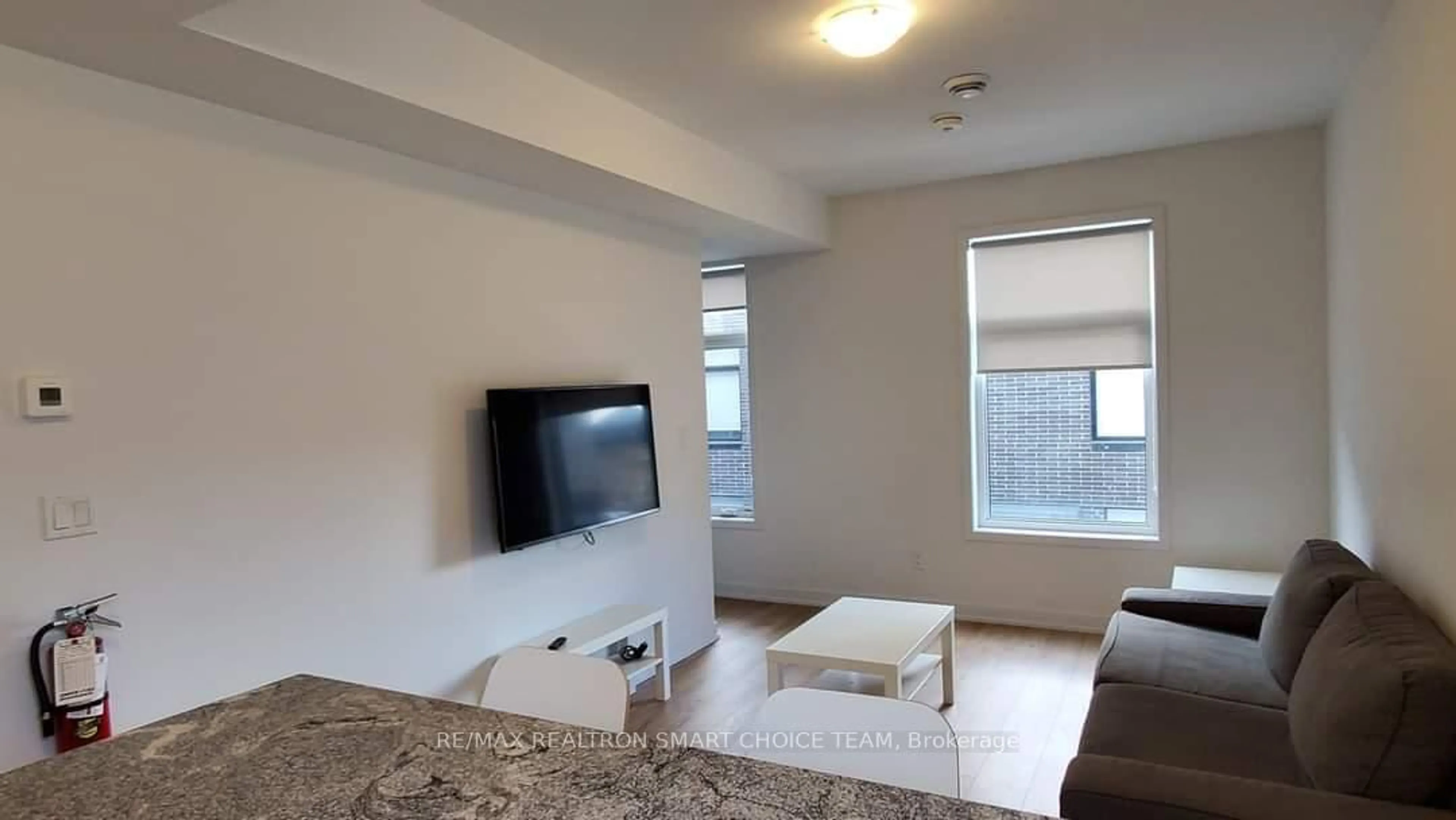 Living room with furniture, unknown for 1740 Simcoe St #50, Oshawa Ontario L1G 4X9