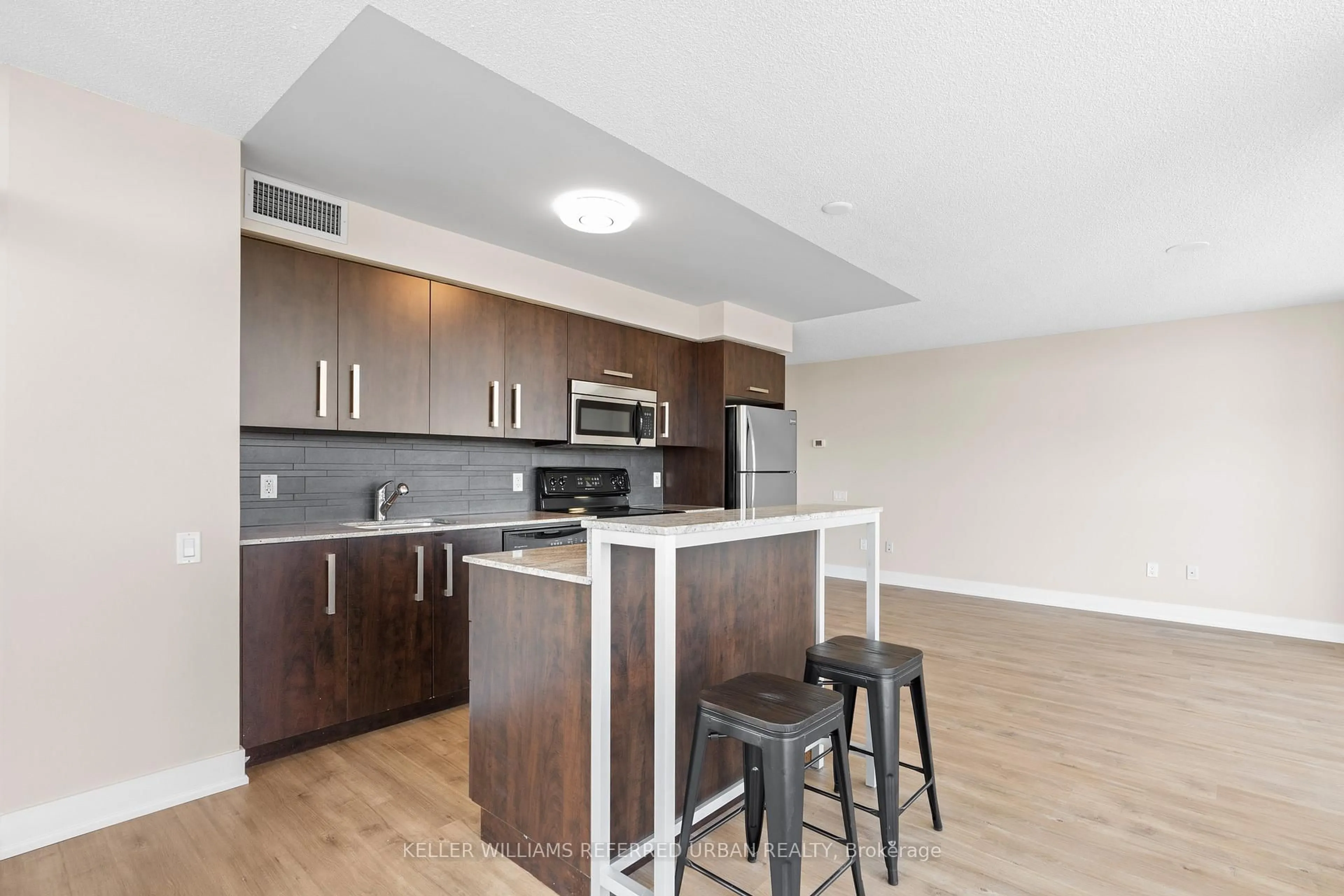 Standard kitchen, wood/laminate floor for 1048 Broadview Ave #308, Toronto Ontario M4K 2B8