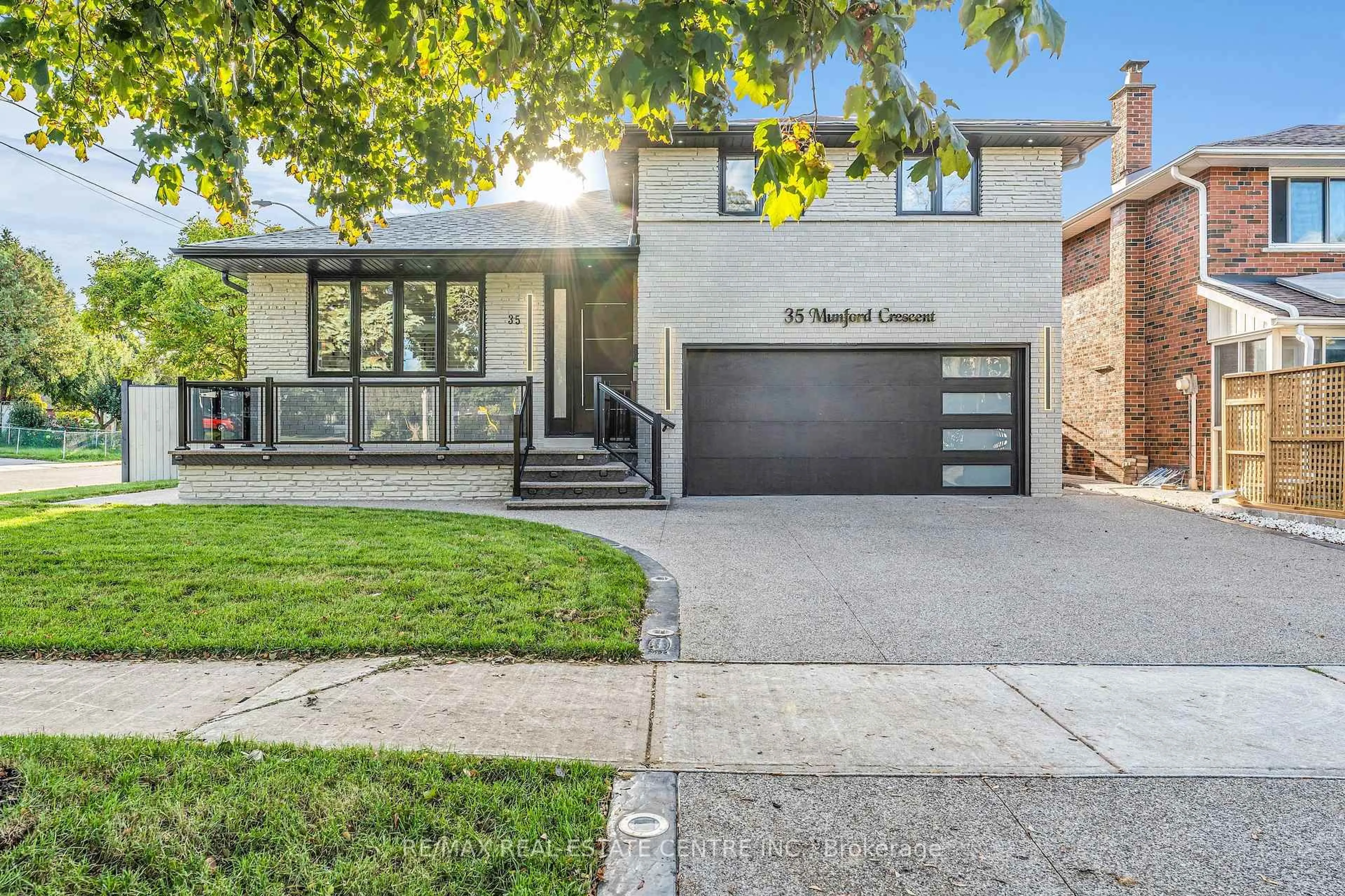Home with brick exterior material, street for 35 Munford Cres, Toronto Ontario M4B 1B9