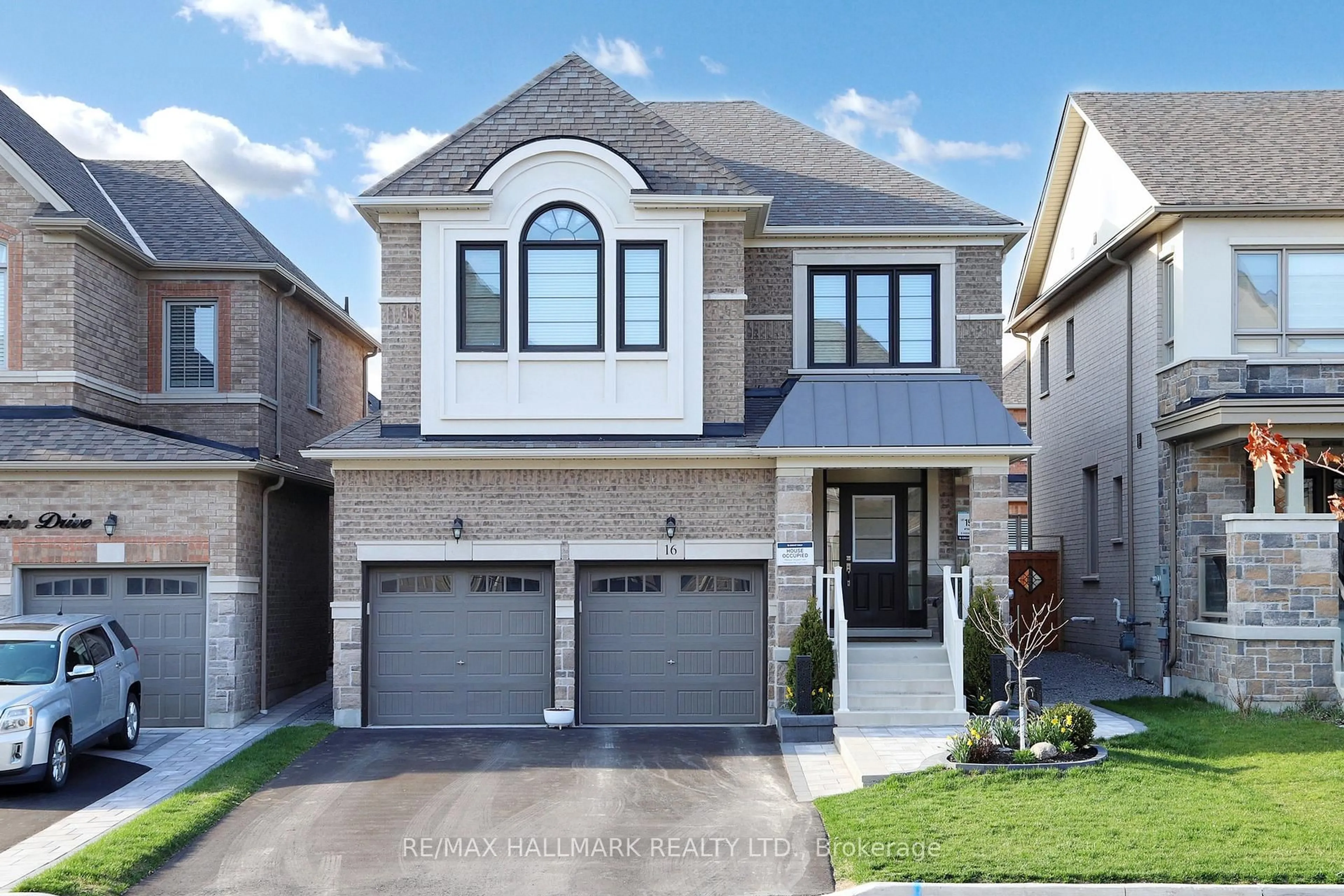 Home with brick exterior material, street for 16 Huggins Dr, Whitby Ontario L1P 0N4