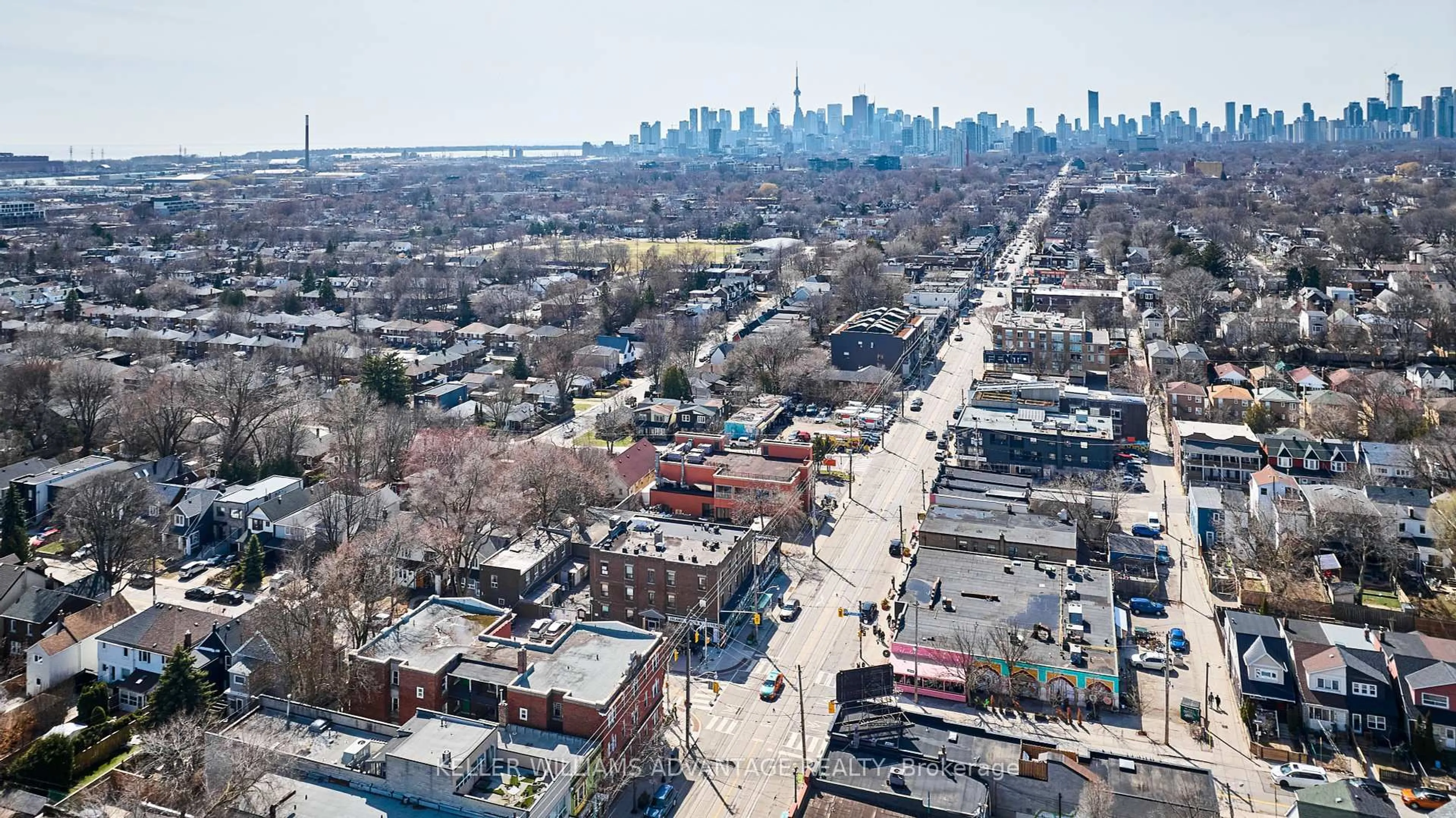 A pic from outside/outdoor area/front of a property/back of a property/a pic from drone, city buildings view from balcony for 1395 Gerrard St, Toronto Ontario M4L 1Z3