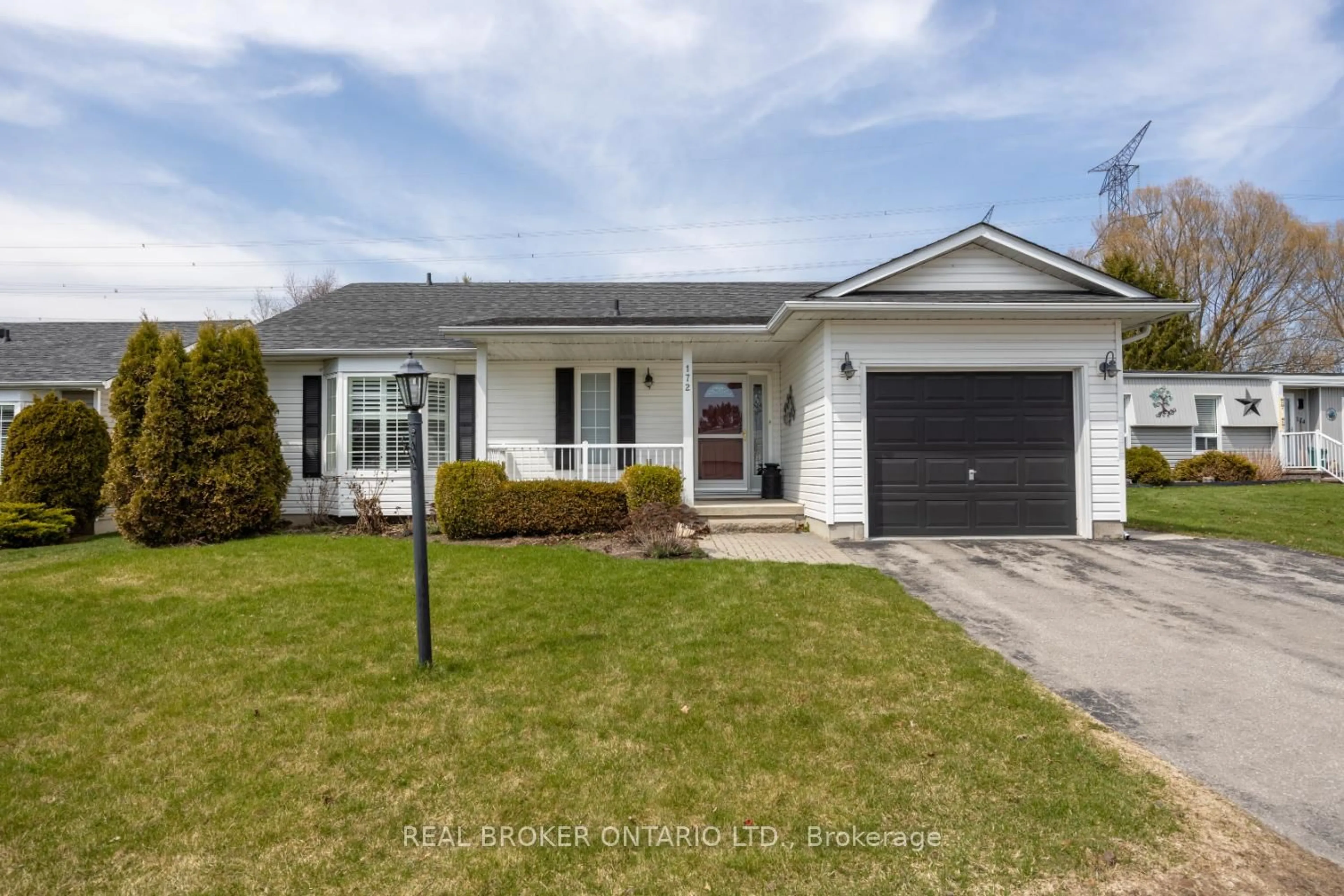 Home with vinyl exterior material, street for 172 Wilmot Tr, Clarington Ontario L1B 1B9