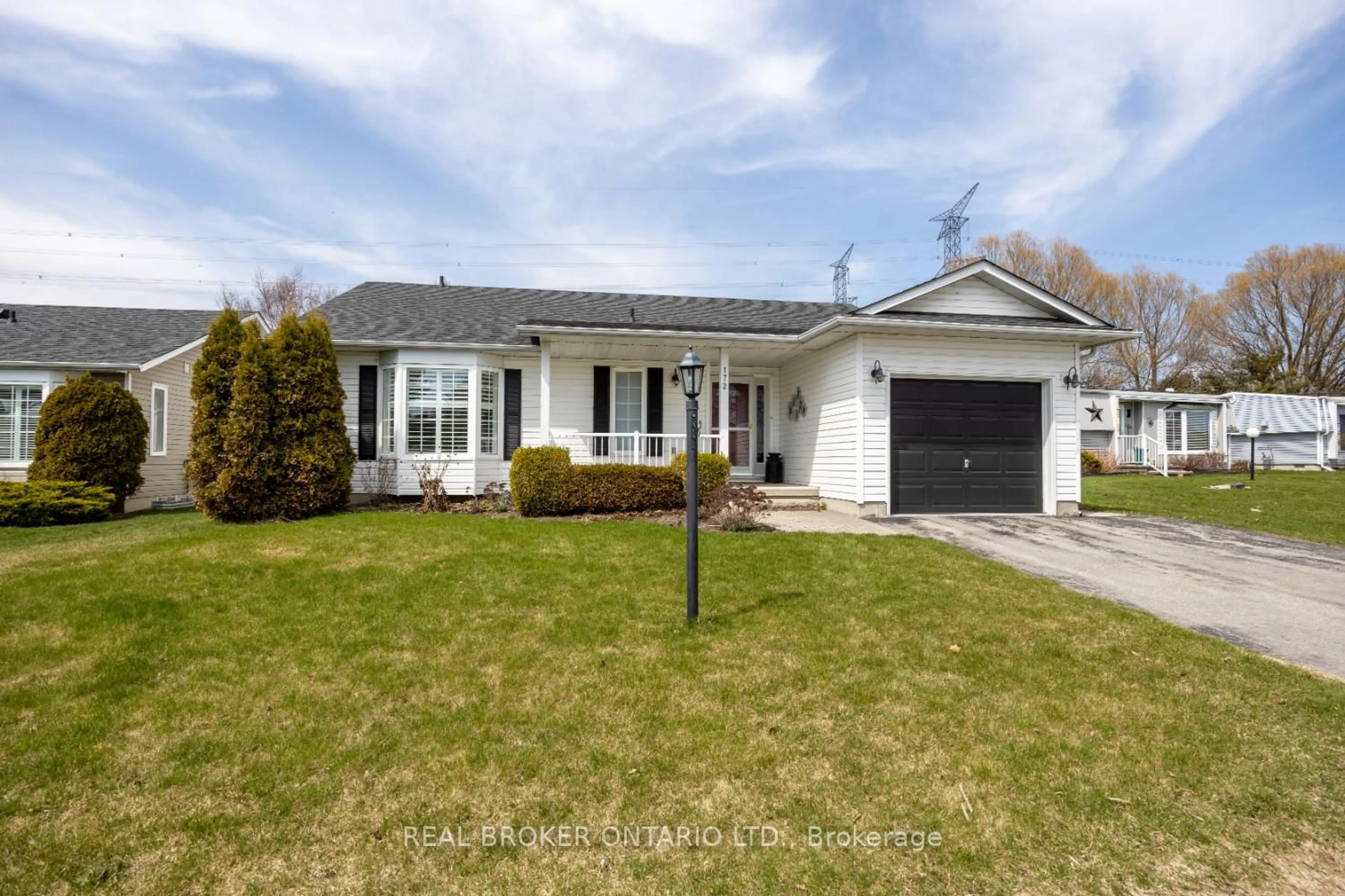 Home with vinyl exterior material, street for 172 Wilmot Tr, Clarington Ontario L1B 1B9