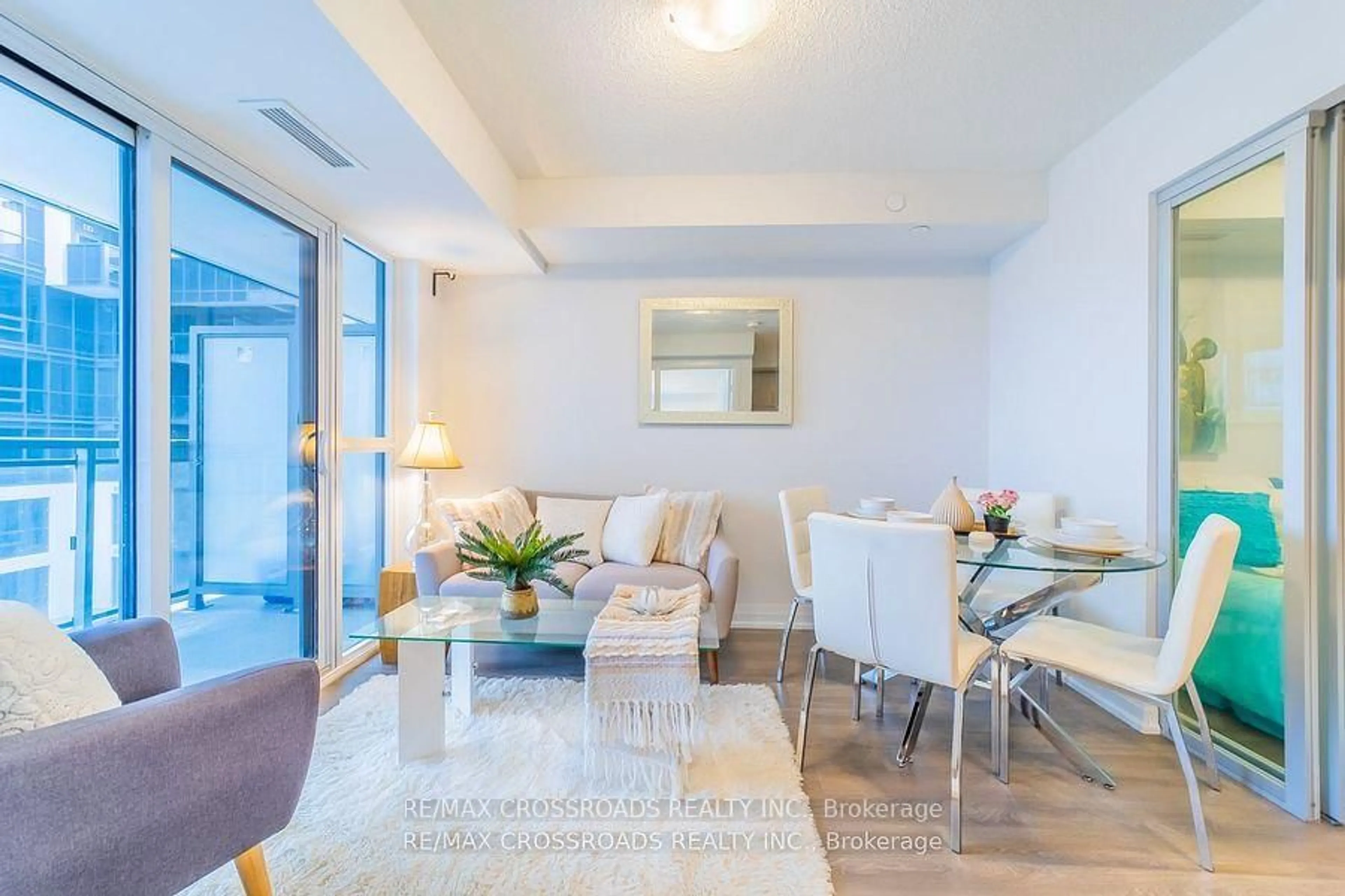Living room with furniture, unknown for 20 Meadowglen Pl #422, Toronto Ontario M1G 0A9