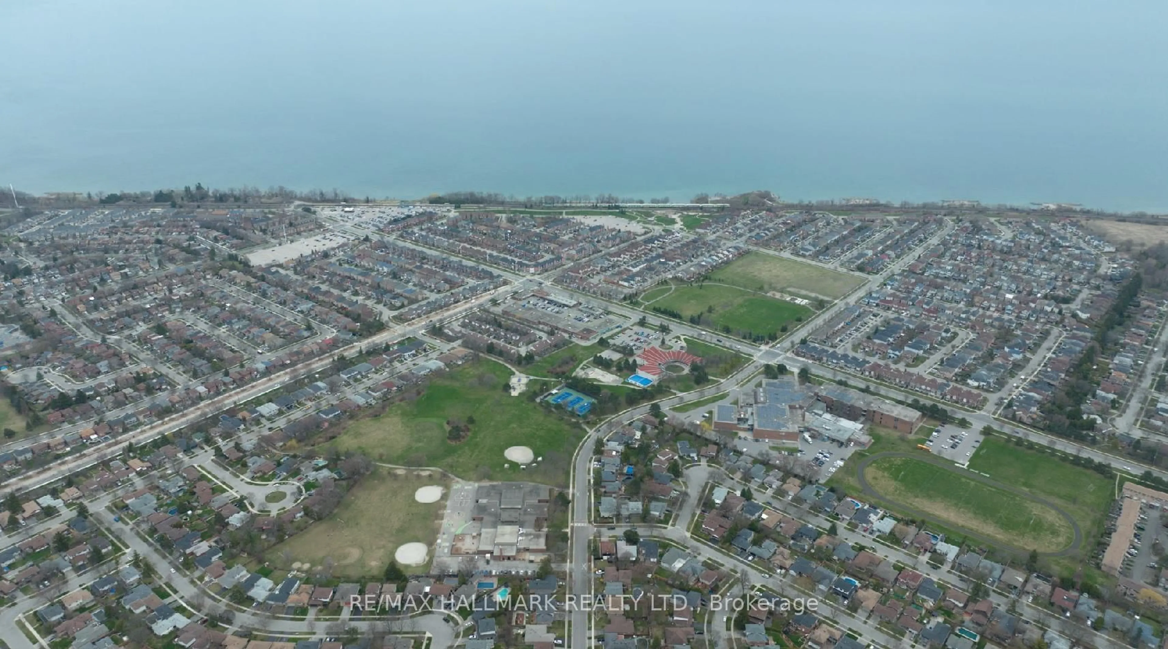 A pic from outside/outdoor area/front of a property/back of a property/a pic from drone, water/lake/river/ocean view for 72 Charlottetown Blvd, Toronto Ontario M1C 2C6