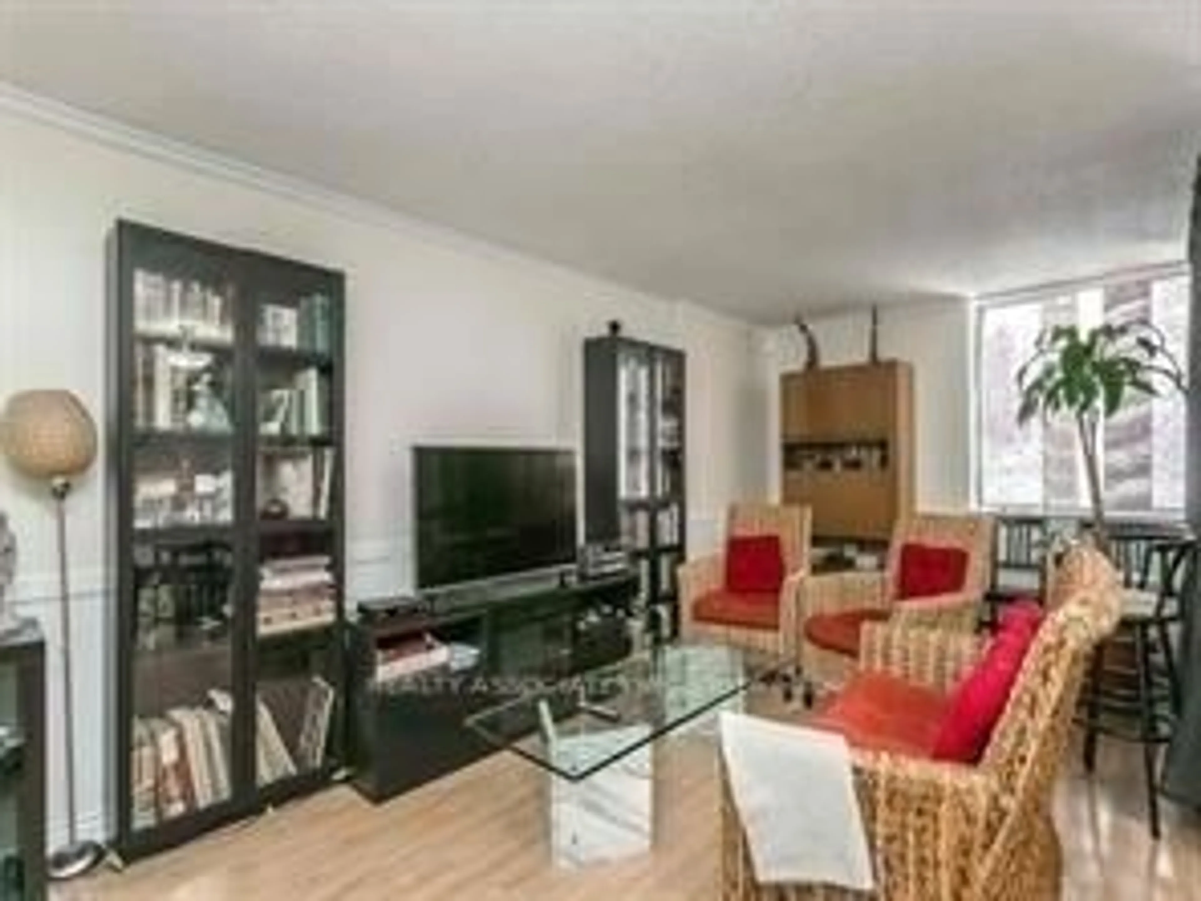 Living room with furniture, unknown for 2500 Bridletowne Circ #107, Toronto Ontario M1W 2V6
