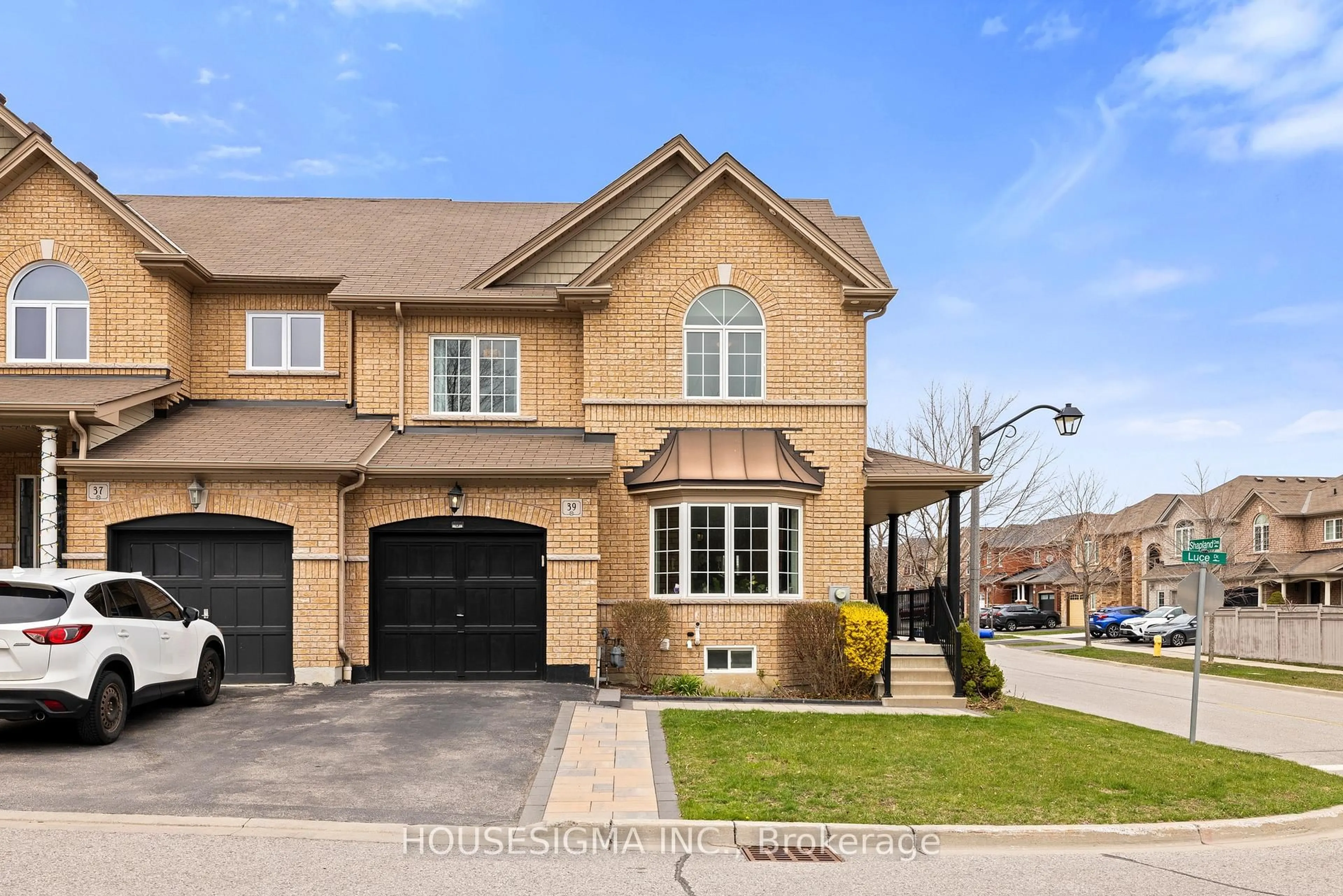 Home with brick exterior material, street for 39 Luce Dr, Ajax Ontario L1Z 0K2