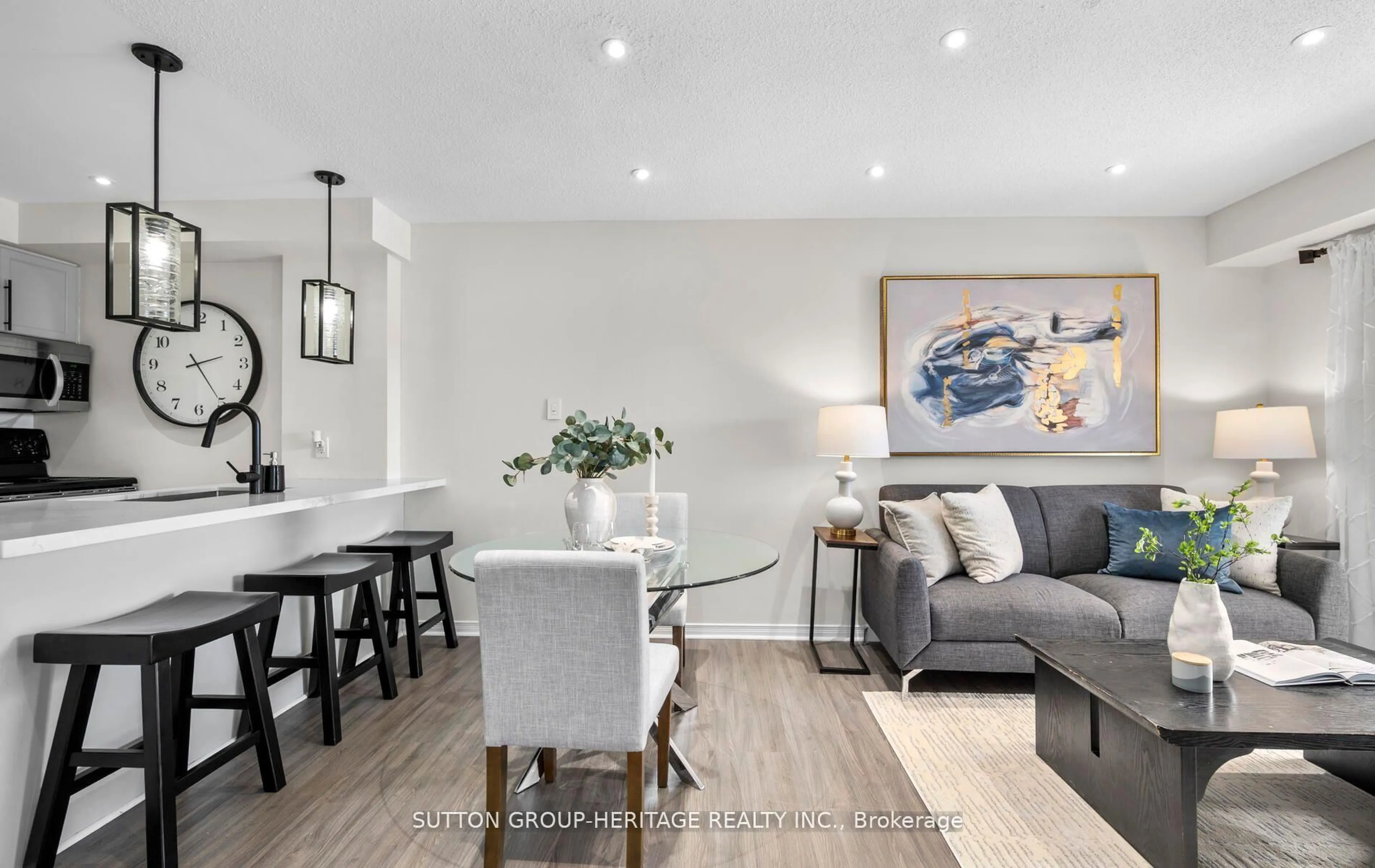 Open concept kitchen, wood/laminate floor for 120 Aspen Springs Dr #308, Clarington Ontario L1C 0G7