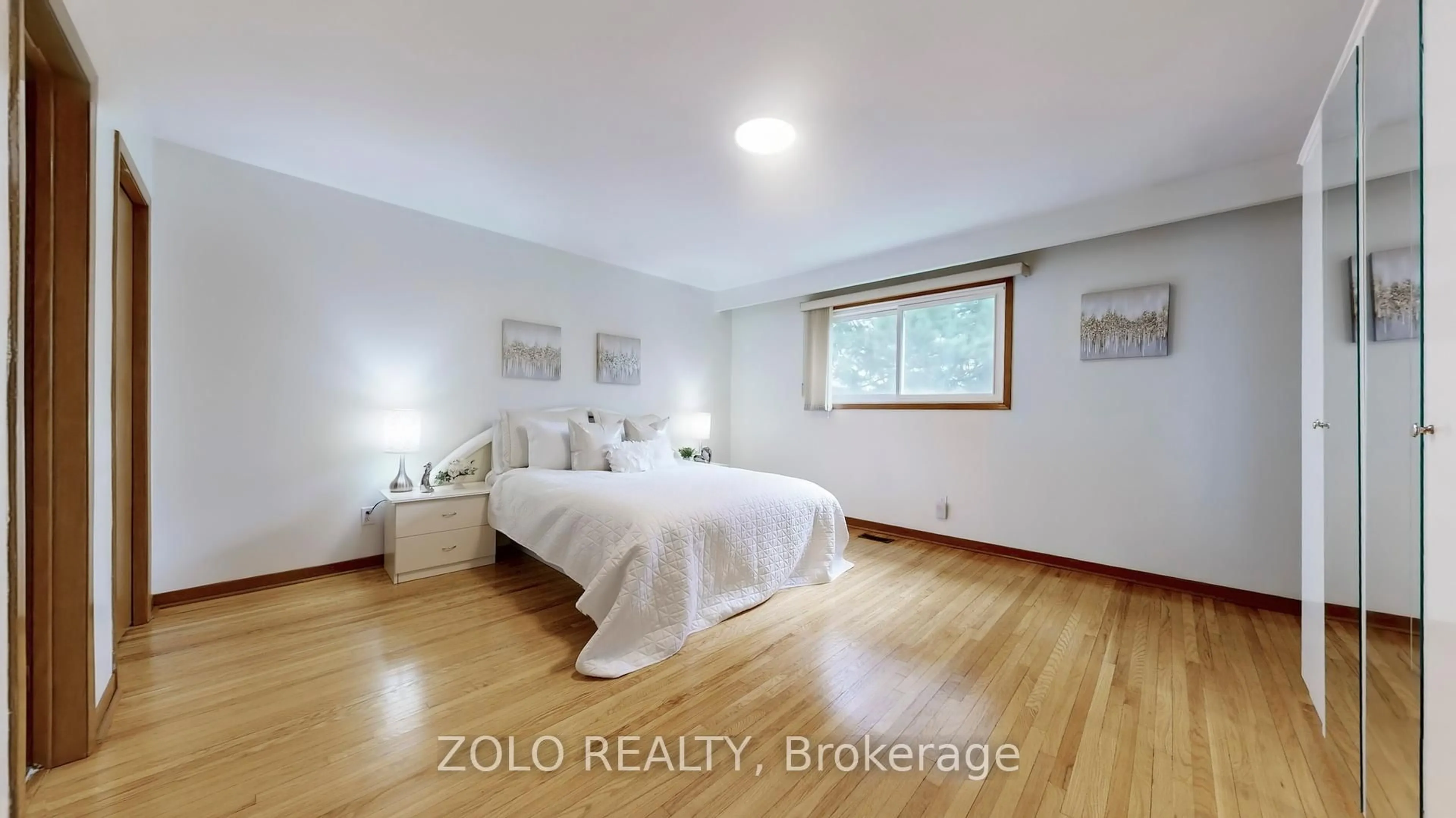 Bedroom with bed, wood/laminate floor for 76 Fulbert Cres, Toronto Ontario M1S 1C6