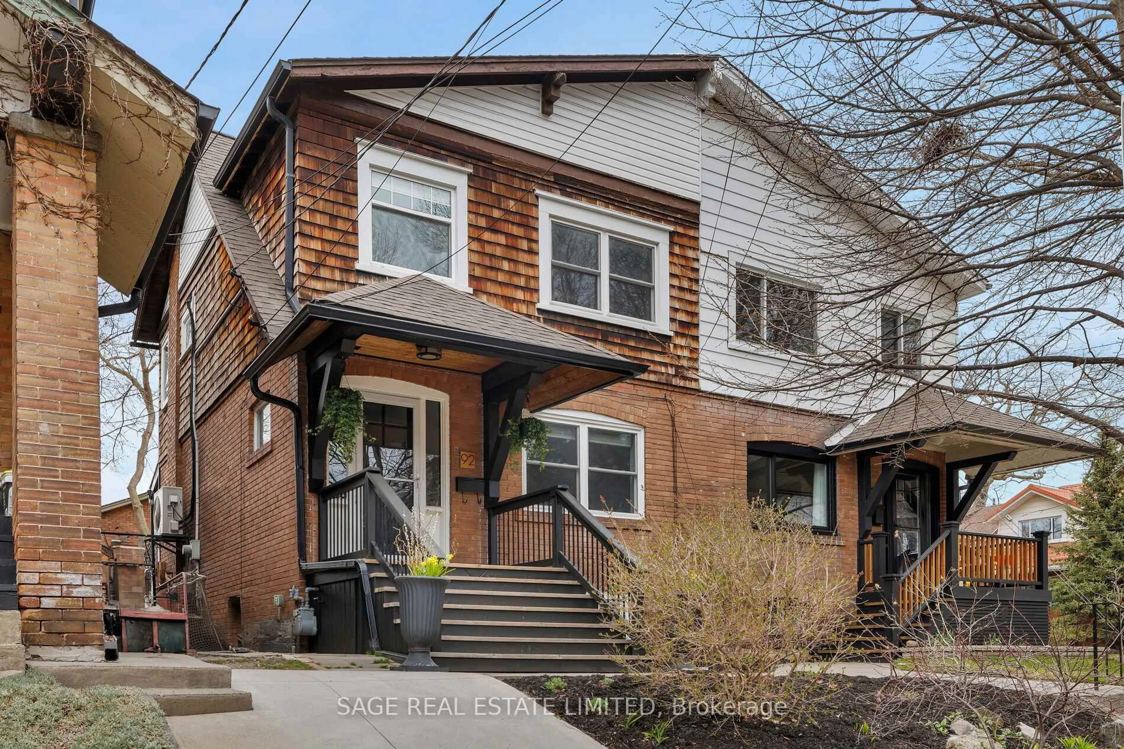 Home with brick exterior material, street for 92 Corley Ave, Toronto Ontario M4E 1V2