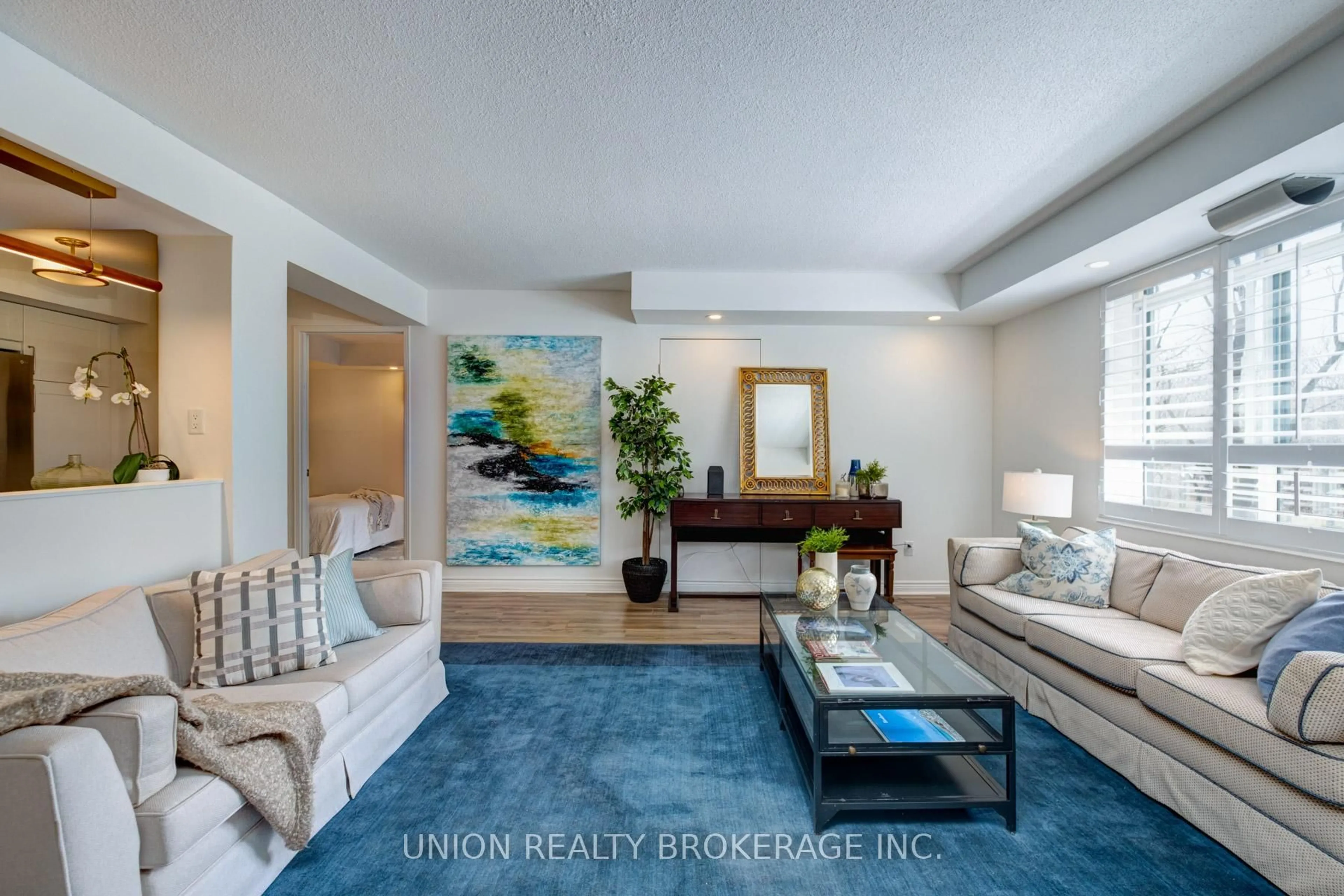 Living room with furniture, unknown for 1091 Kingston Rd #317, Toronto Ontario M1N 4E5