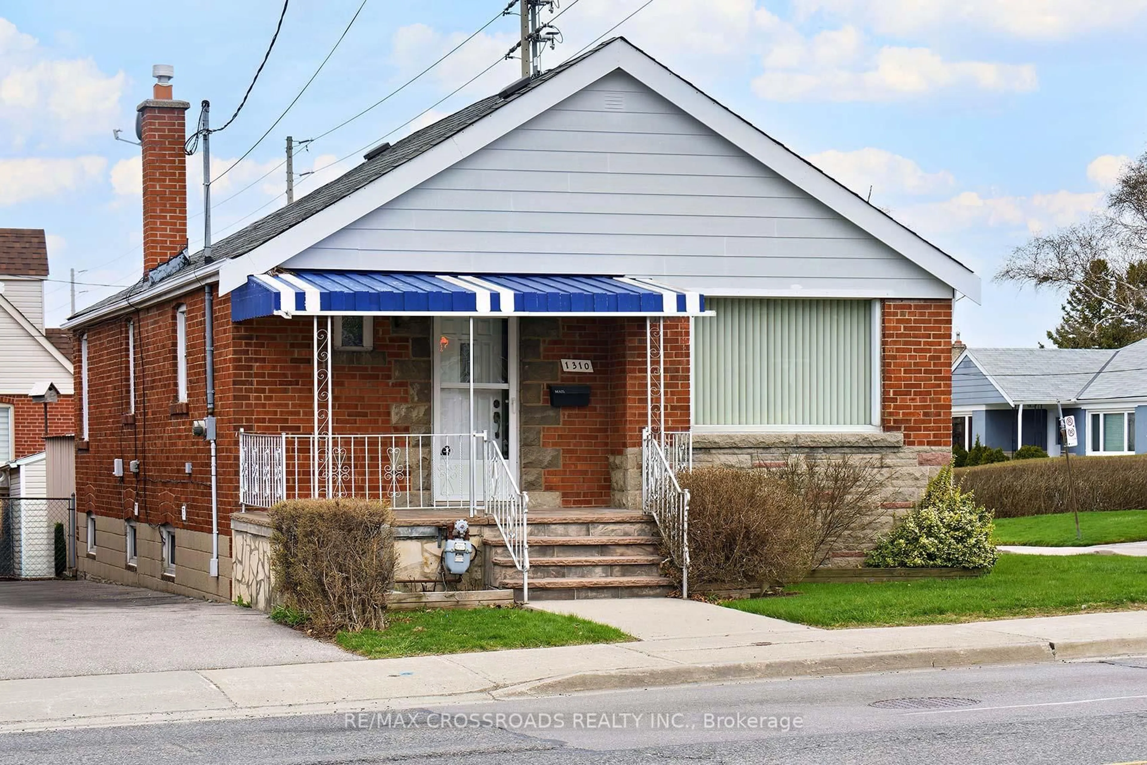 Home with brick exterior material, street for 1310 Victoria Park Ave, Toronto Ontario M4B 2L2