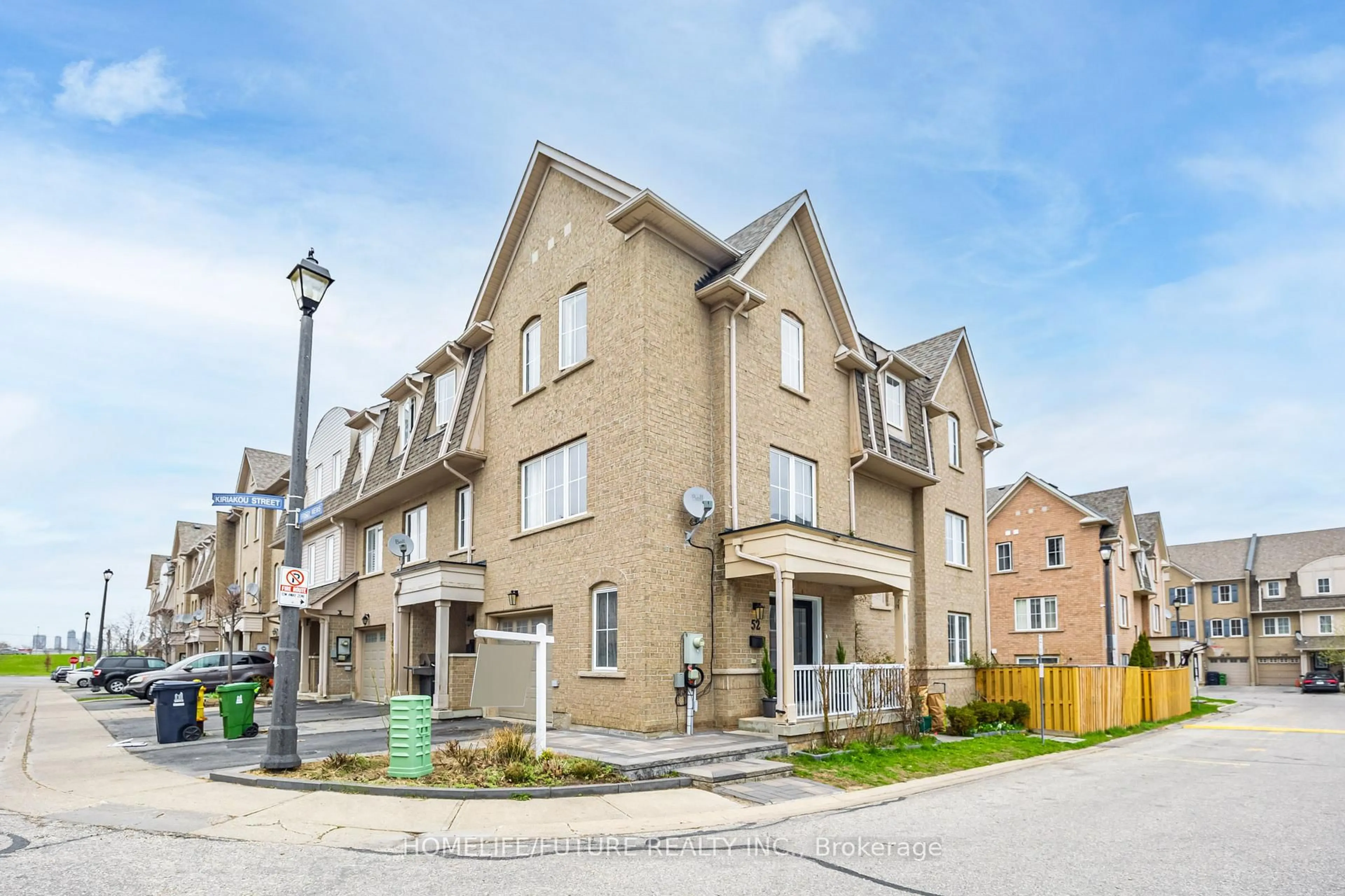 Home with brick exterior material, street for 52 Kiriakou St #58, Toronto Ontario M1P 5H3