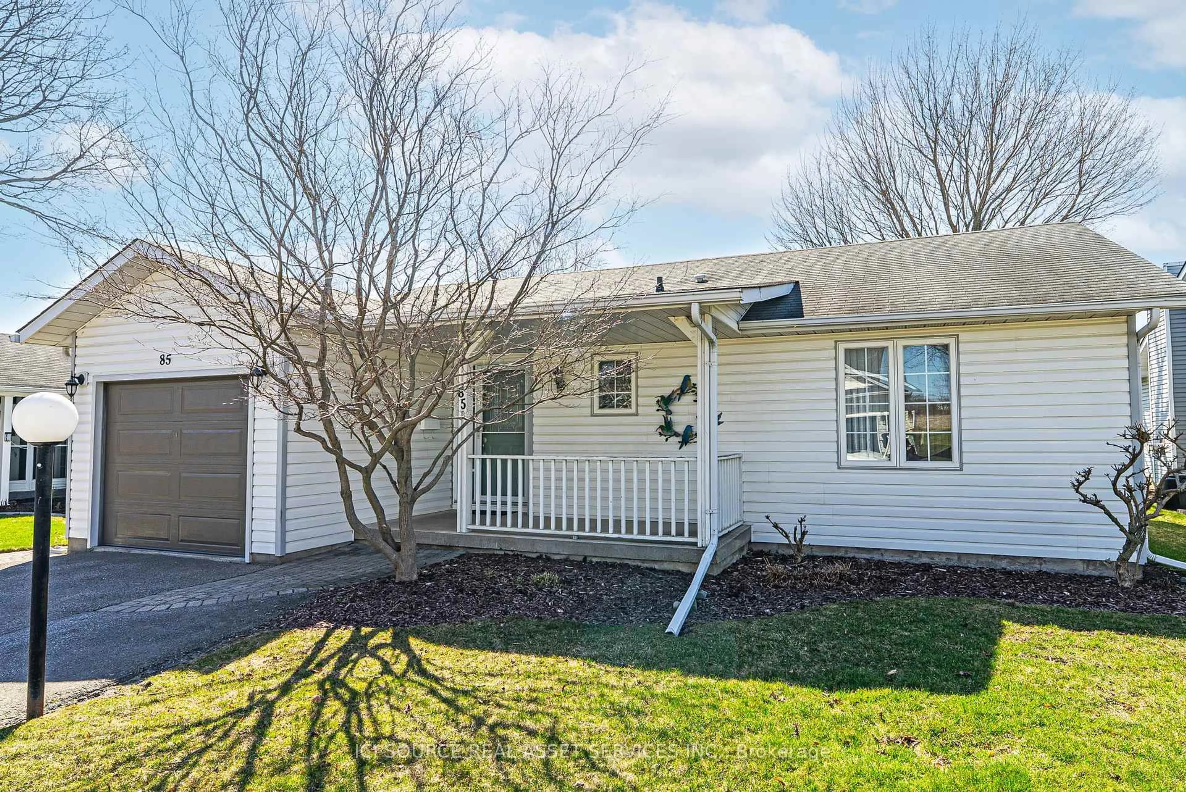 Home with vinyl exterior material, street for 85 Wilmot Tr, Clarington Ontario L1B 1B8