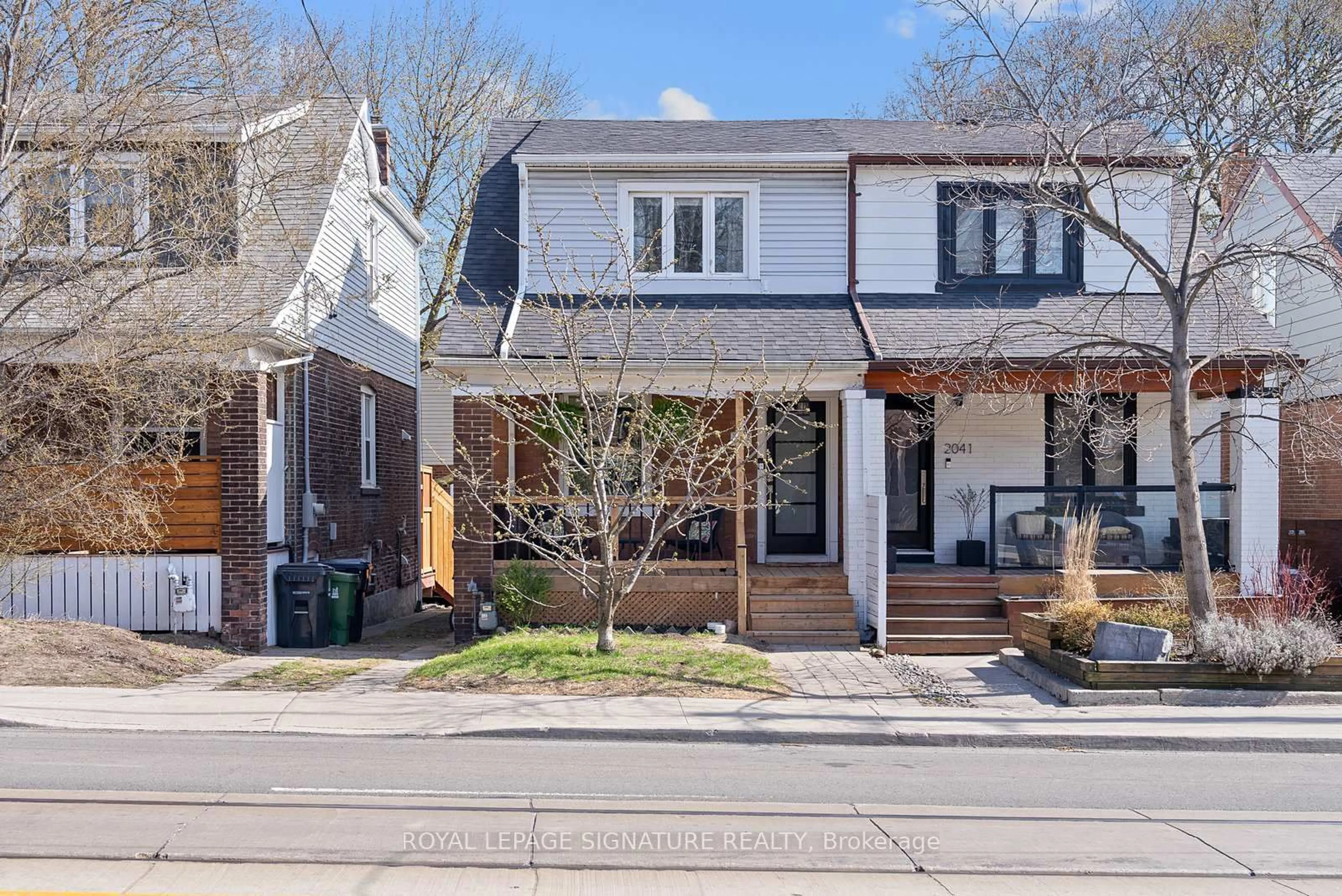 Home with brick exterior material, street for 2043 Gerrard St, Toronto Ontario M4E 2B3