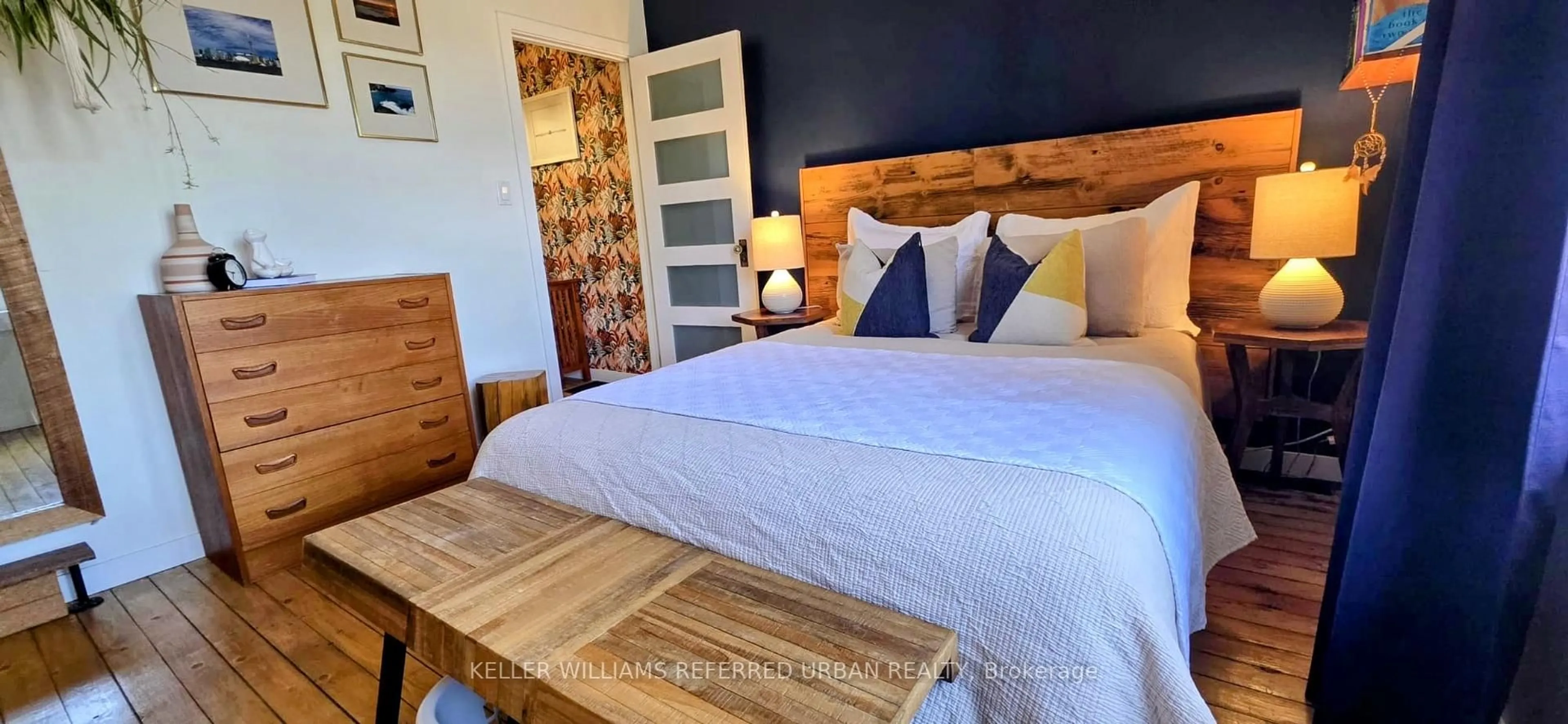 Bedroom with bed, wood/laminate floor for 6 Hannaford St, Toronto Ontario M4E 3G7
