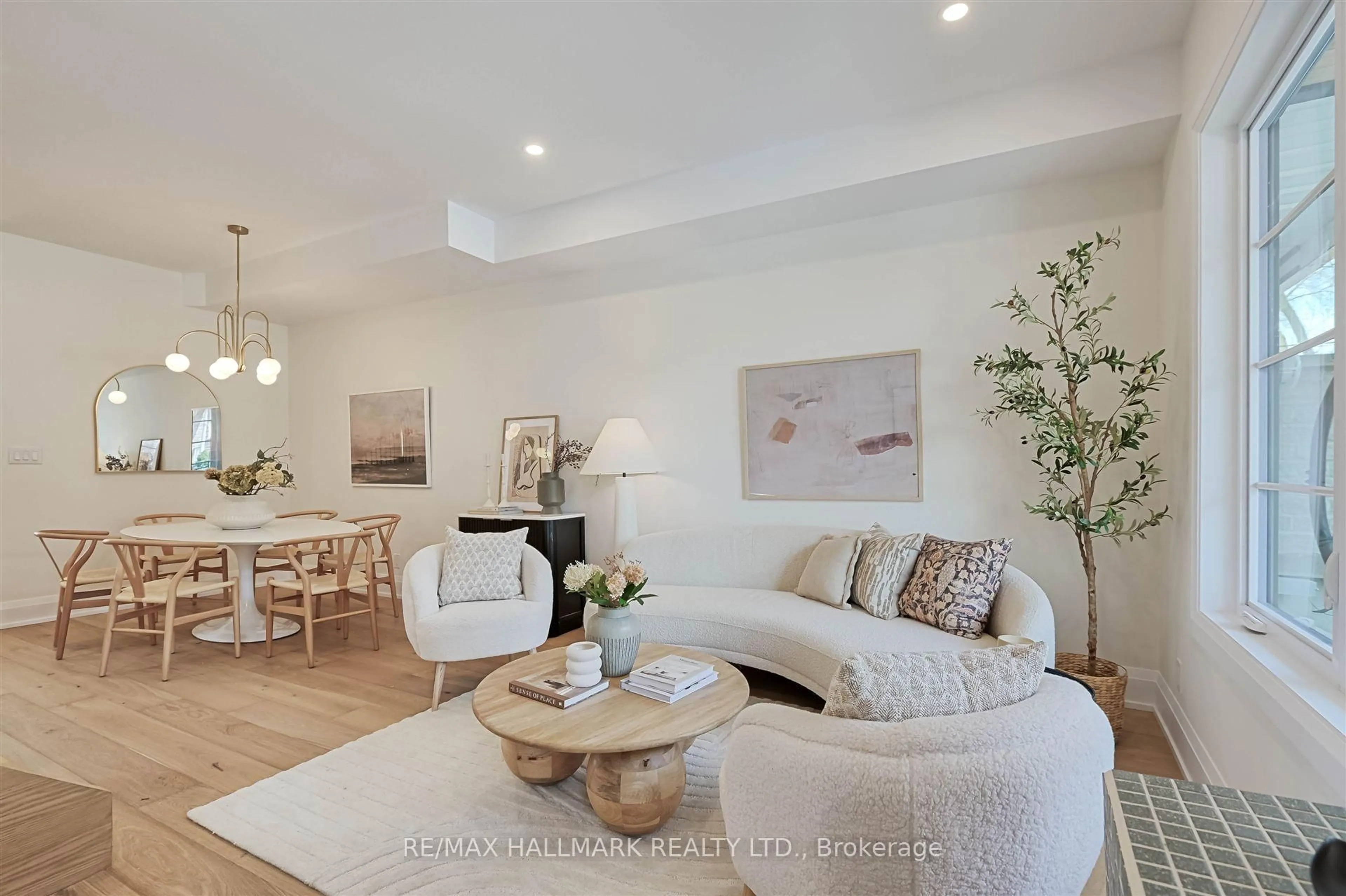 Living room with furniture, wood/laminate floor for 139 Hazelwood Ave, Toronto Ontario M4J 1K4