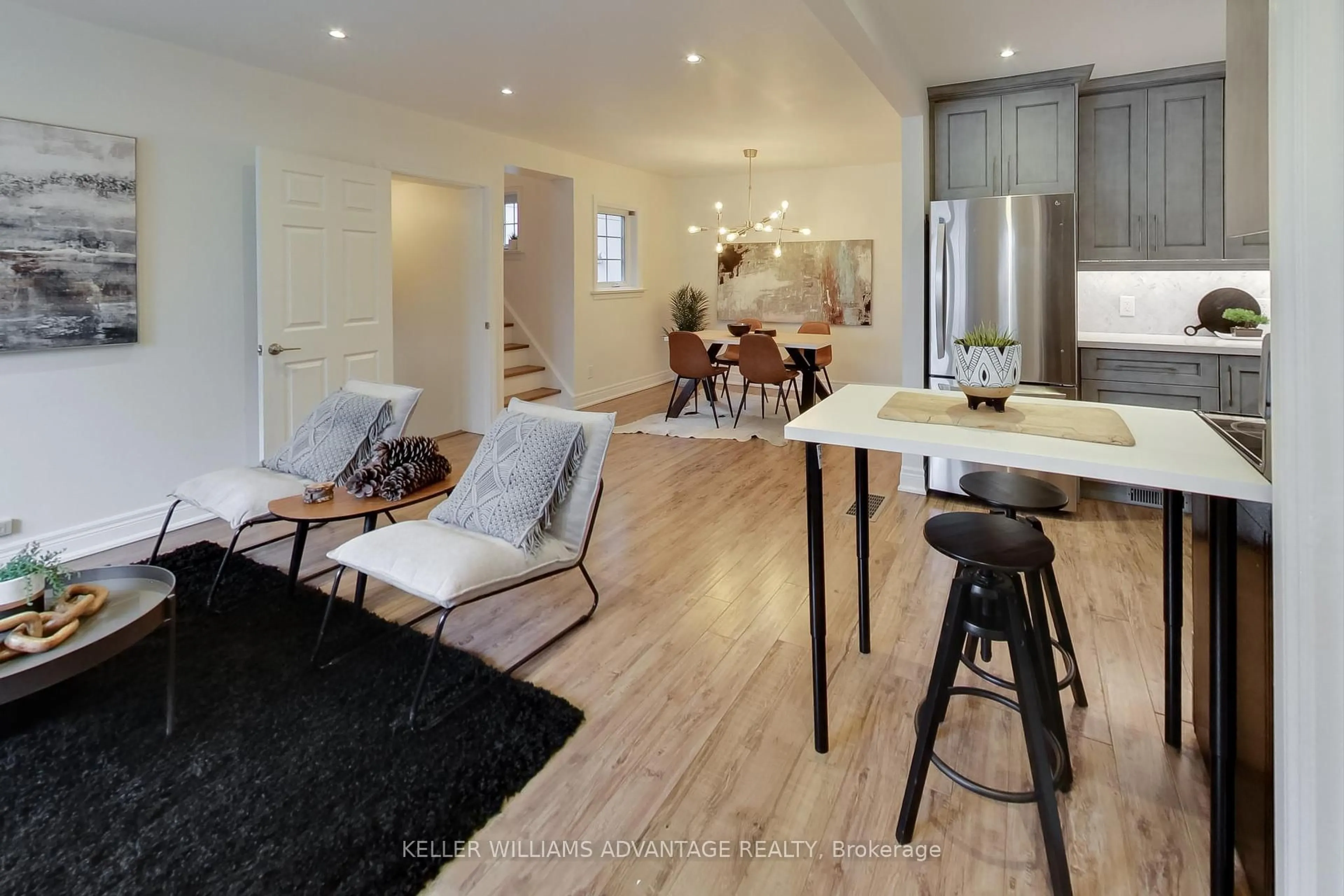 Open concept kitchen, wood/laminate floor for 12 Parkland Rd, Toronto Ontario M1N 1Y5