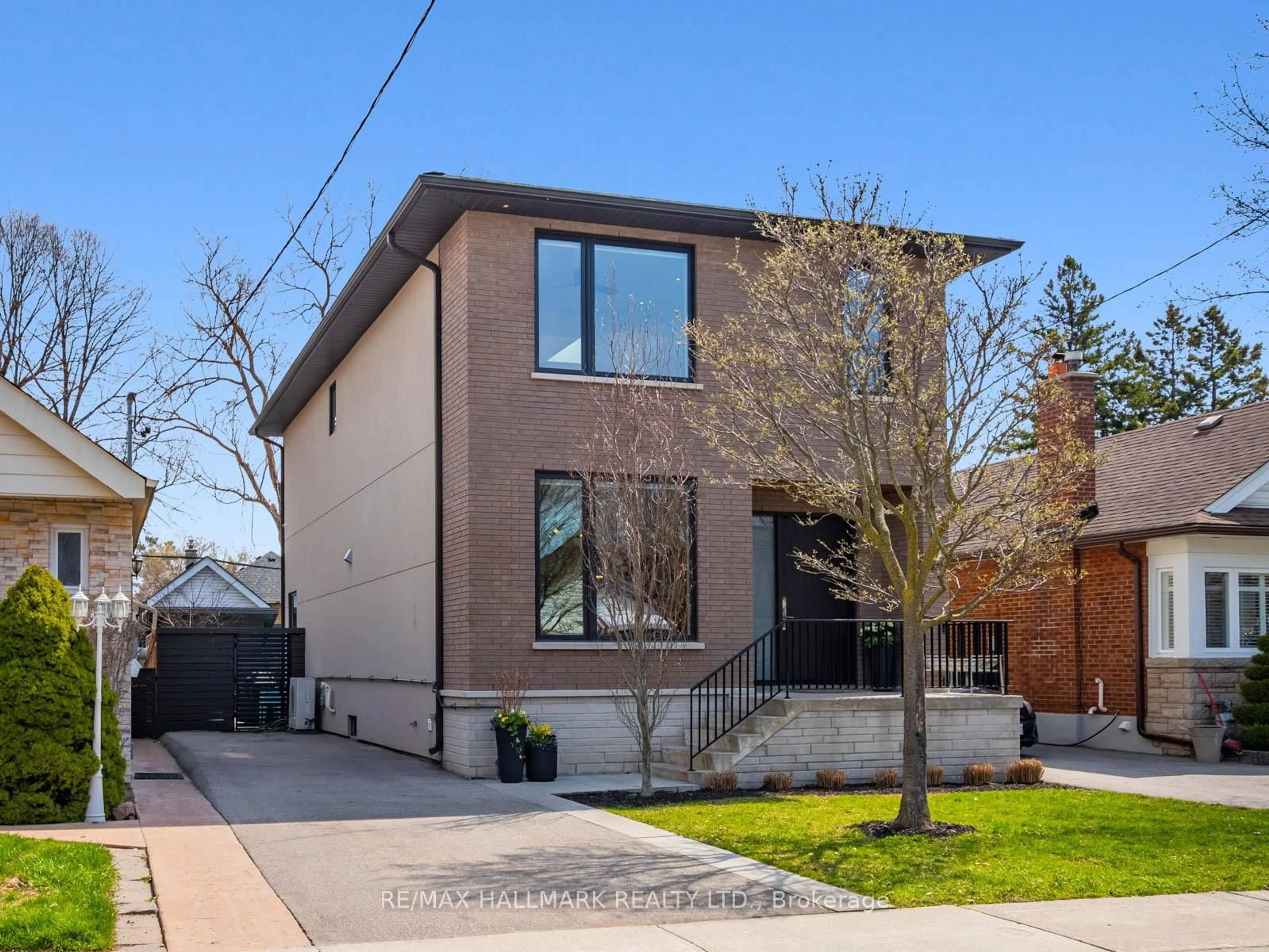Home with brick exterior material, street for 29 Treadway Blvd, Toronto Ontario M4C 3H6