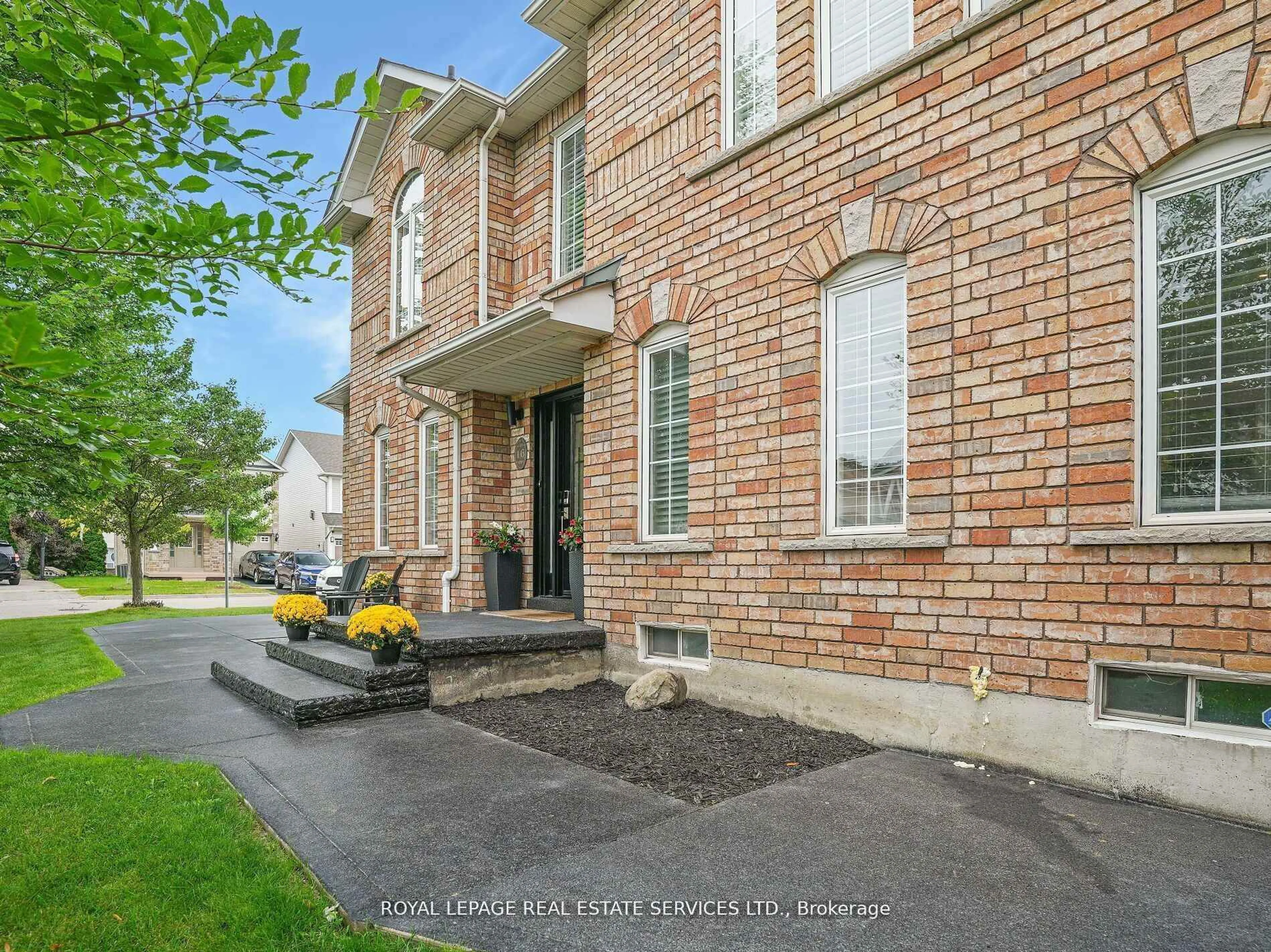 Home with brick exterior material, street for 16 Woolf Cres, Ajax Ontario L1S 7N5