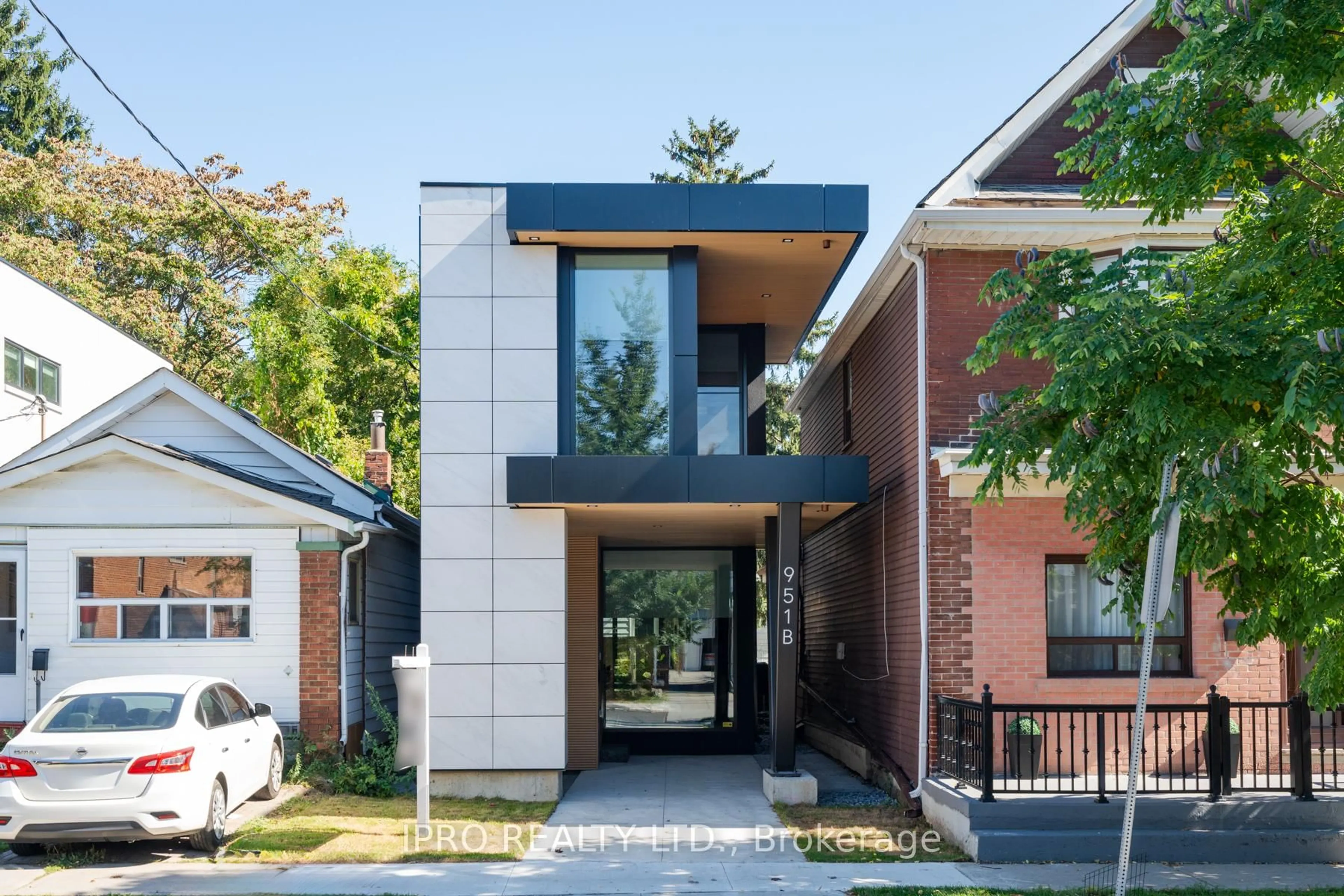 Home with brick exterior material, street for 951B Greenwood Ave, Toronto Ontario M4J 4C6