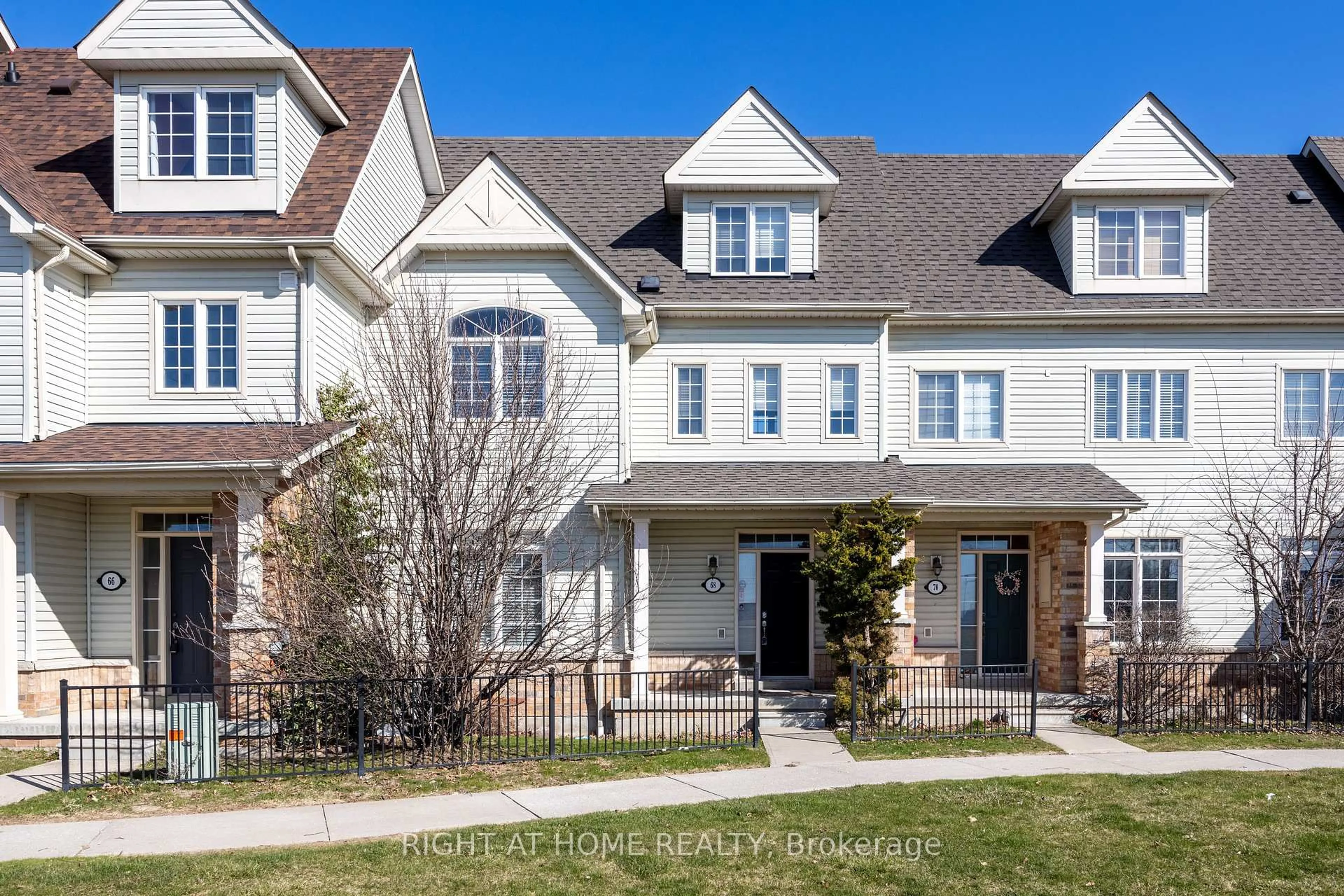 Home with brick exterior material, street for 68 Wicker Park Way, Whitby Ontario L1R 0C7