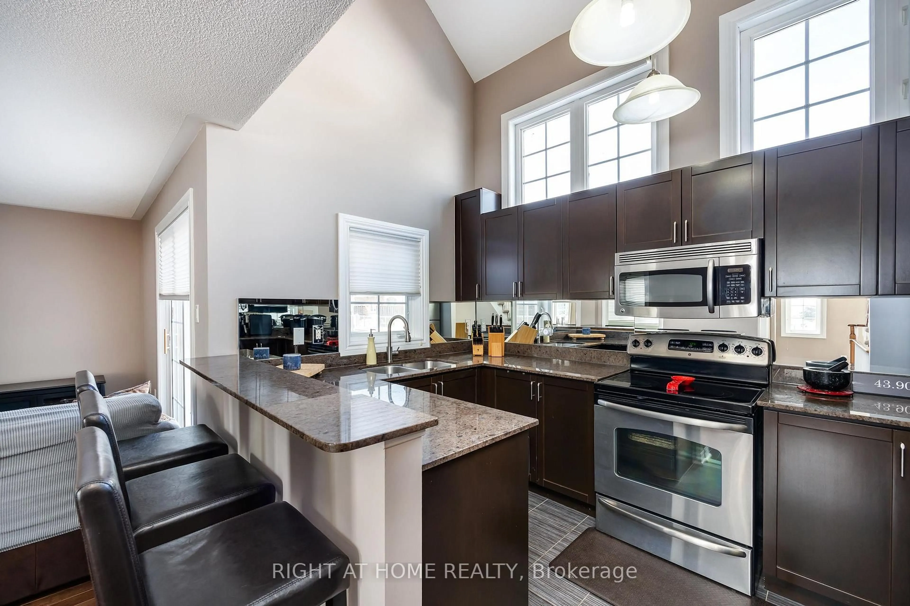 Open concept kitchen, unknown for 68 Wicker Park Way, Whitby Ontario L1R 0C7