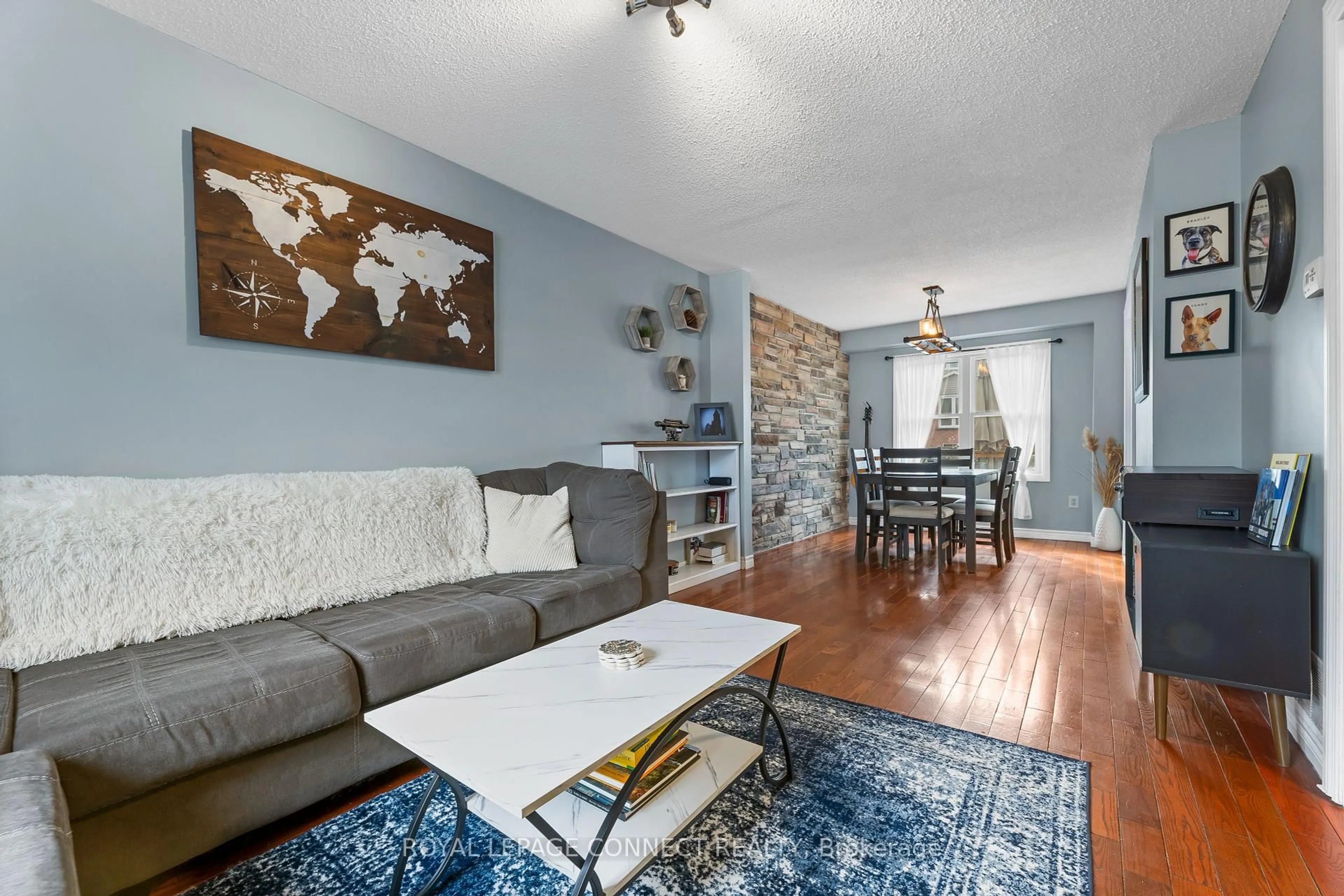 Living room with furniture, wood/laminate floor for 15 Patterson Cres, Ajax Ontario L1S 6R1
