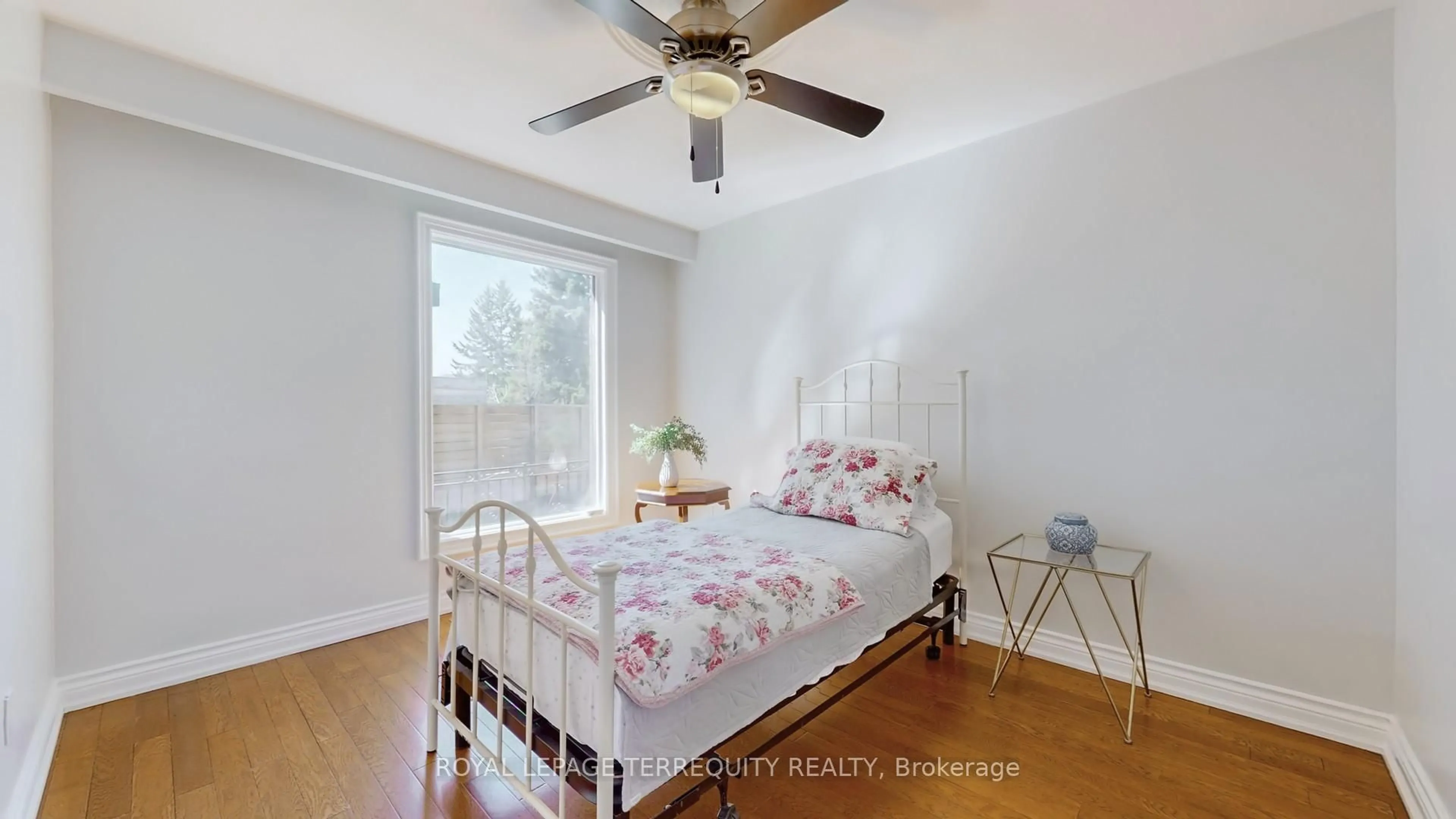 Bedroom with bed, wood/laminate floor for 8 Ashall Blvd, Toronto Ontario M4B 3C1