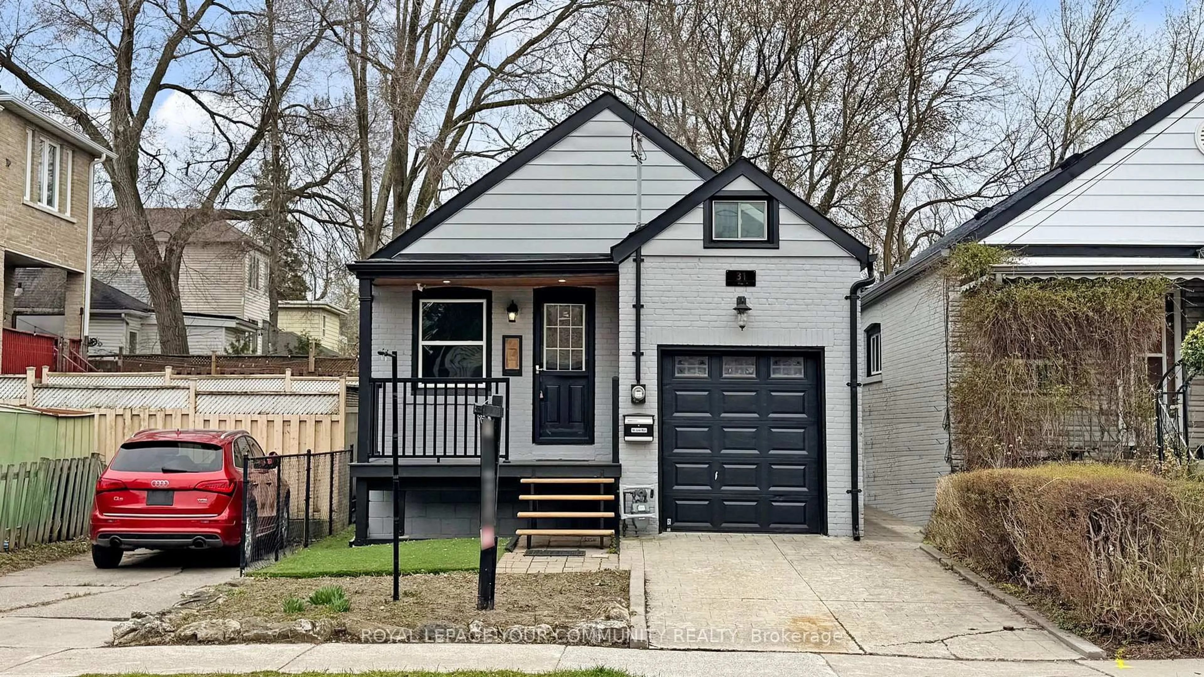 Home with vinyl exterior material, street for 31 Hamstead Ave, Toronto Ontario M4C 2S3