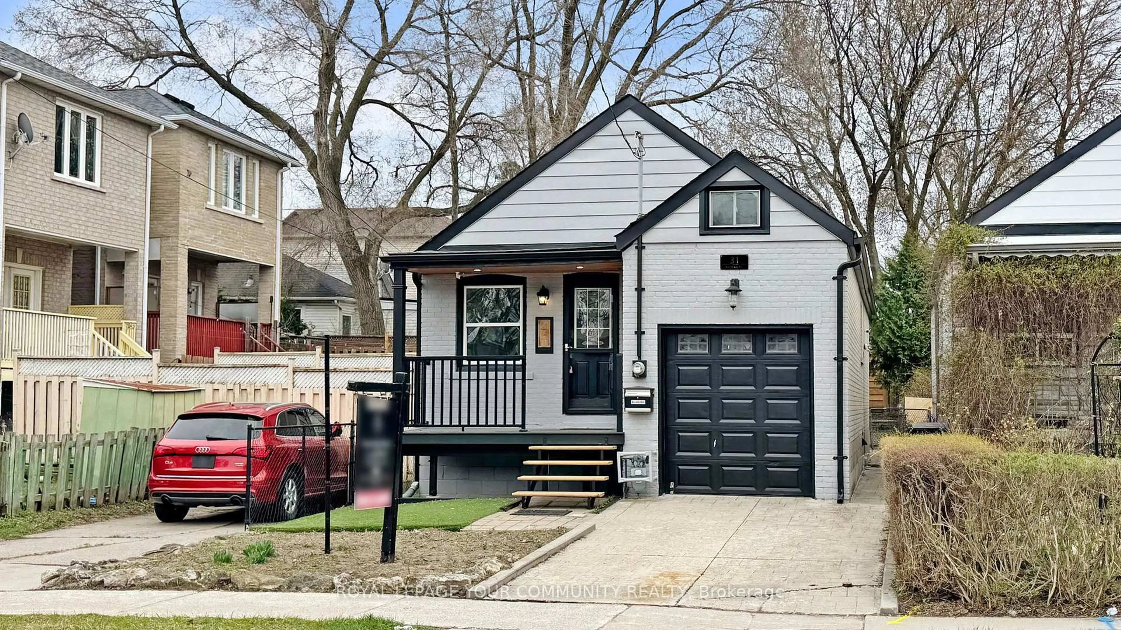 Home with vinyl exterior material, street for 31 Hamstead Ave, Toronto Ontario M4C 2S3