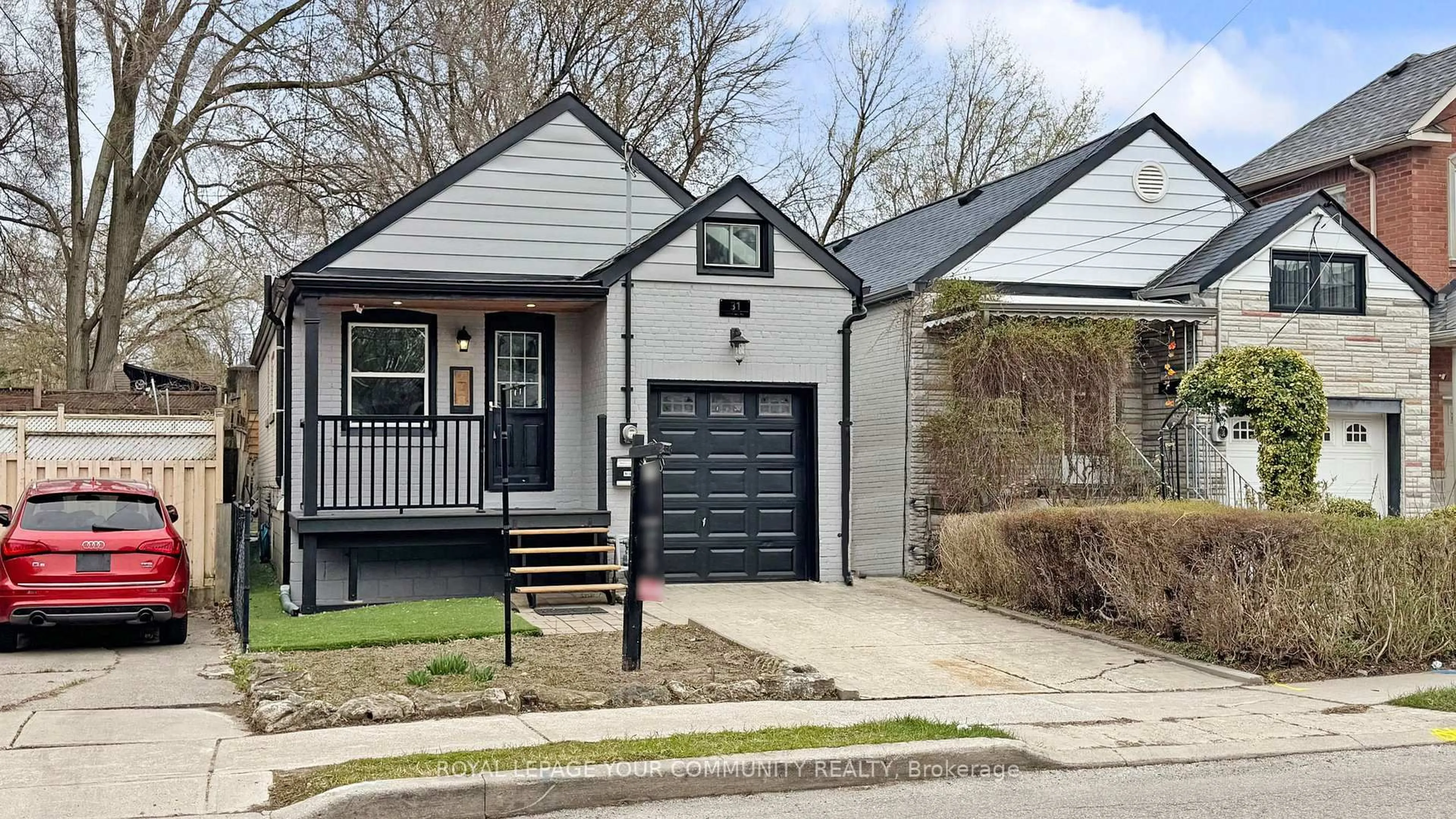 Home with vinyl exterior material, street for 31 Hamstead Ave, Toronto Ontario M4C 2S3