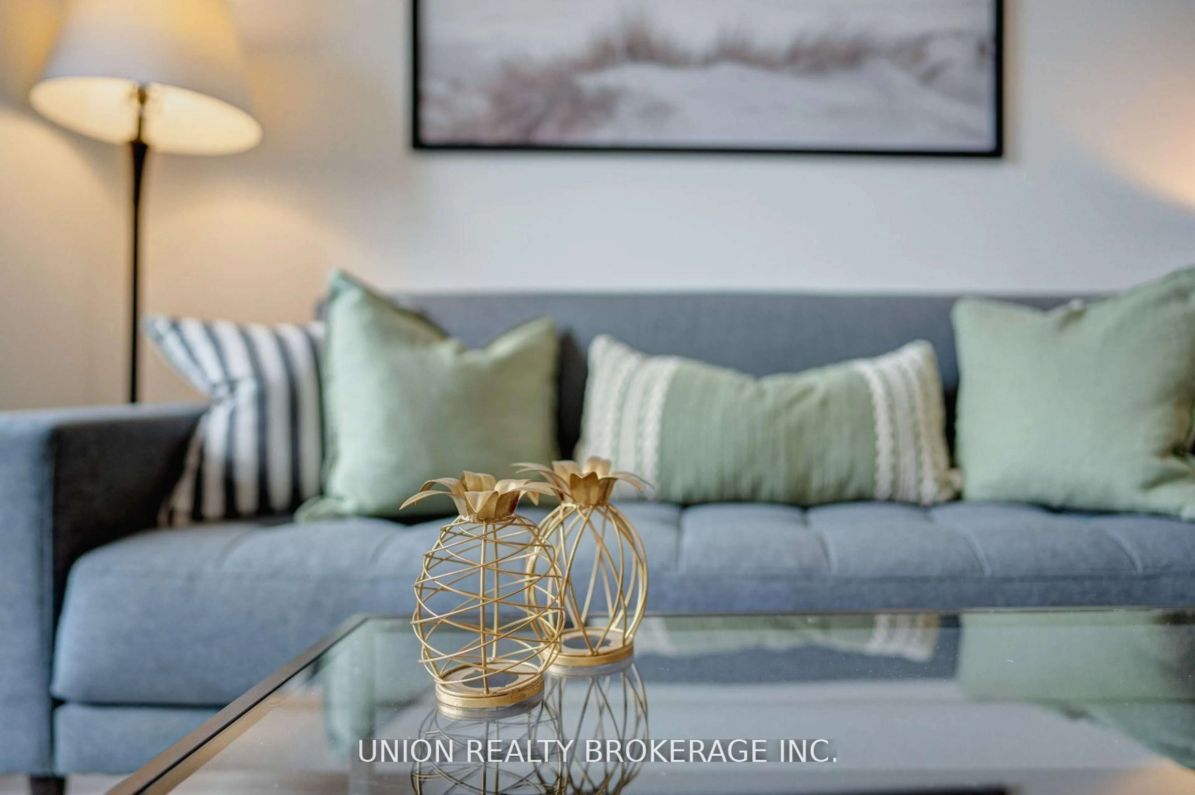Living room with furniture, wood/laminate floor for 2799 Kingston Rd #617, Toronto Ontario M1M 0E3