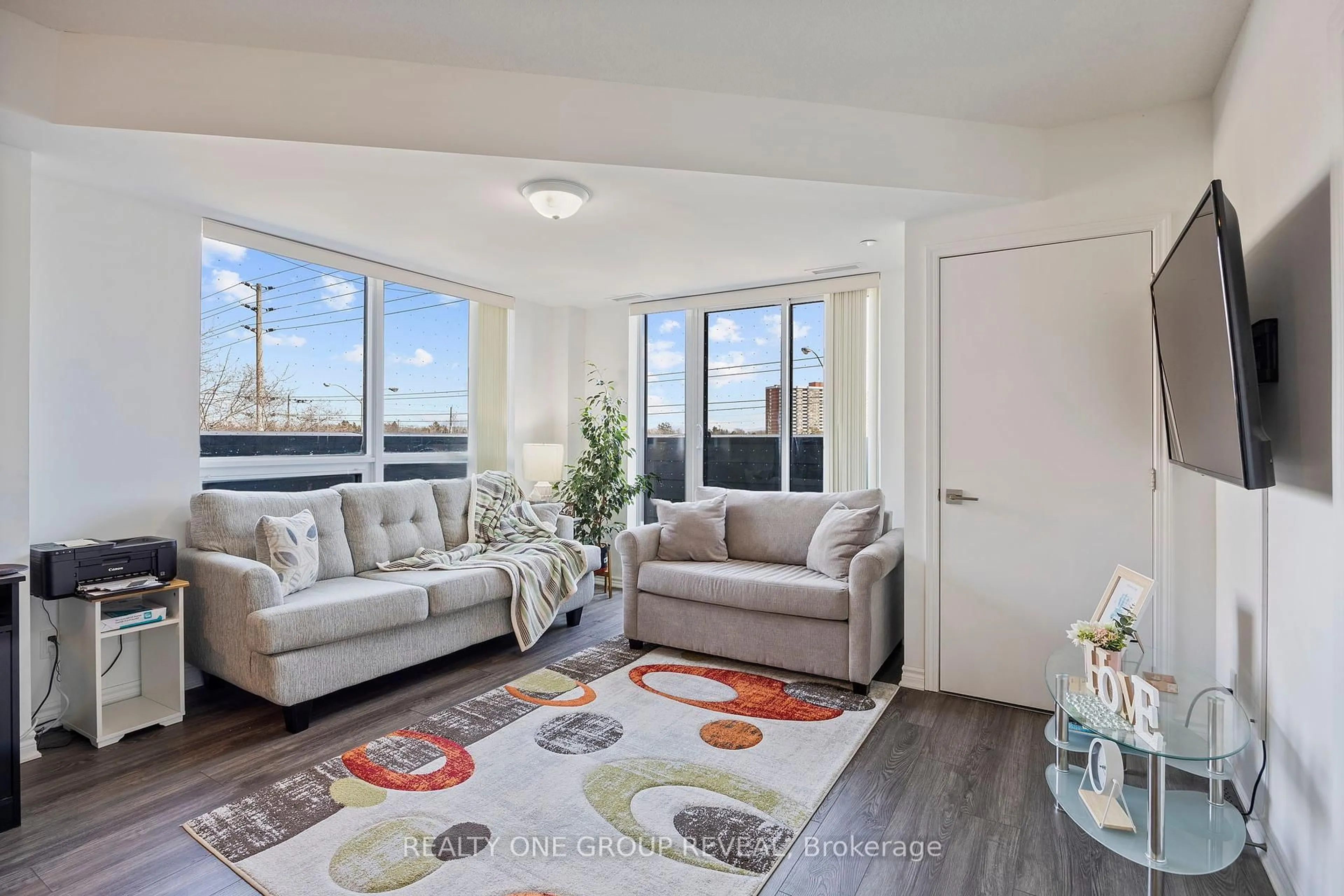 Living room with furniture, unknown for 1 Falaise Rd #313, Toronto Ontario M1E 0B9