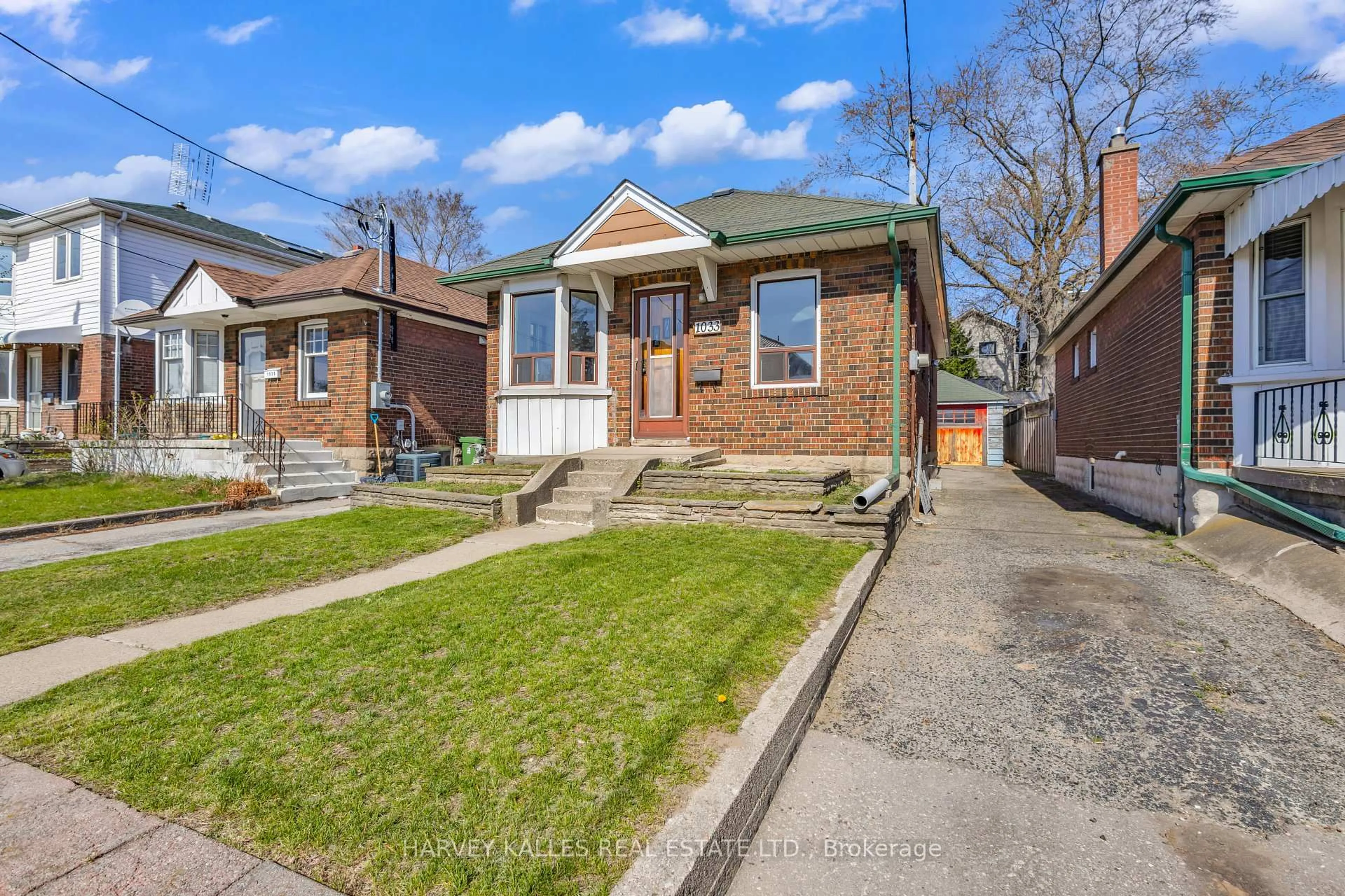 Home with brick exterior material, street for 1033 Greenwood Ave, Toronto Ontario M4J 4C9