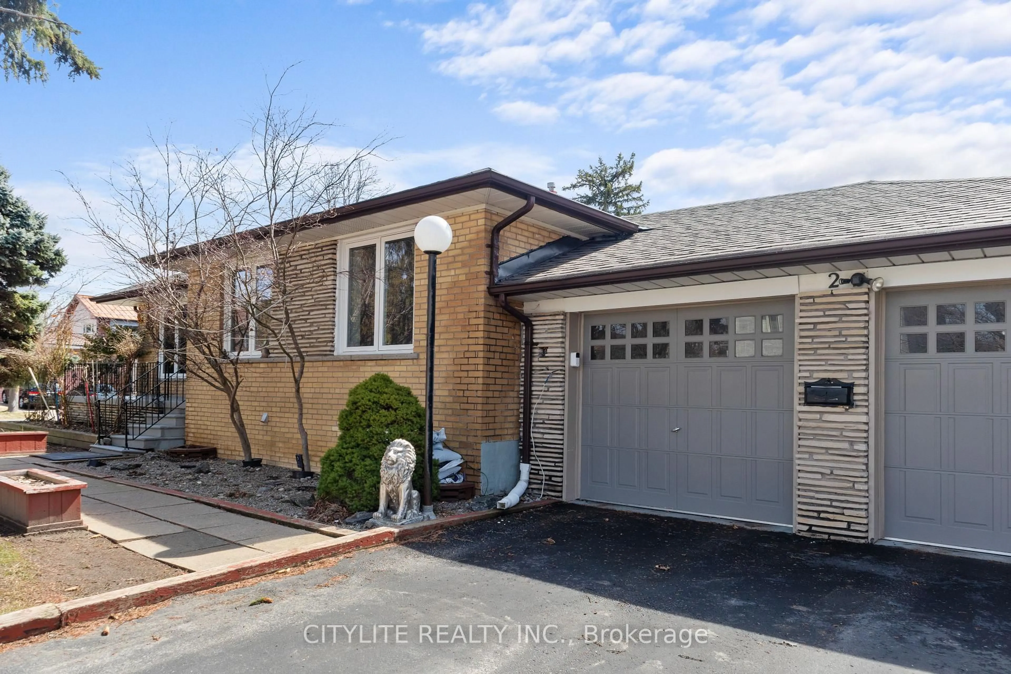 Home with brick exterior material, street for 2 Emmeline Cres, Toronto Ontario M1S 1L2