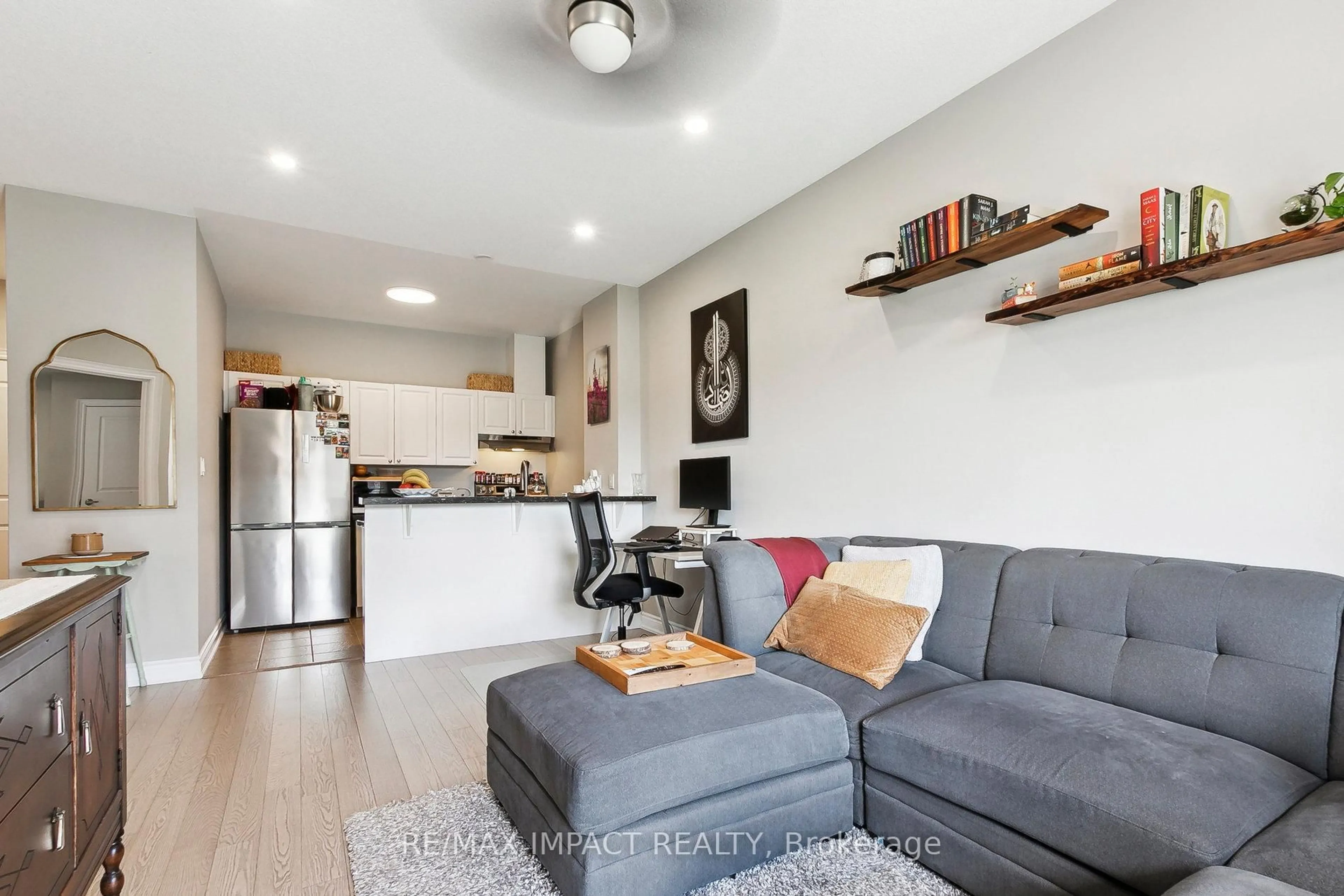 Living room with furniture, wood/laminate floor for 1 Sidney Lane #L-05, Clarington Ontario L1C 0N5