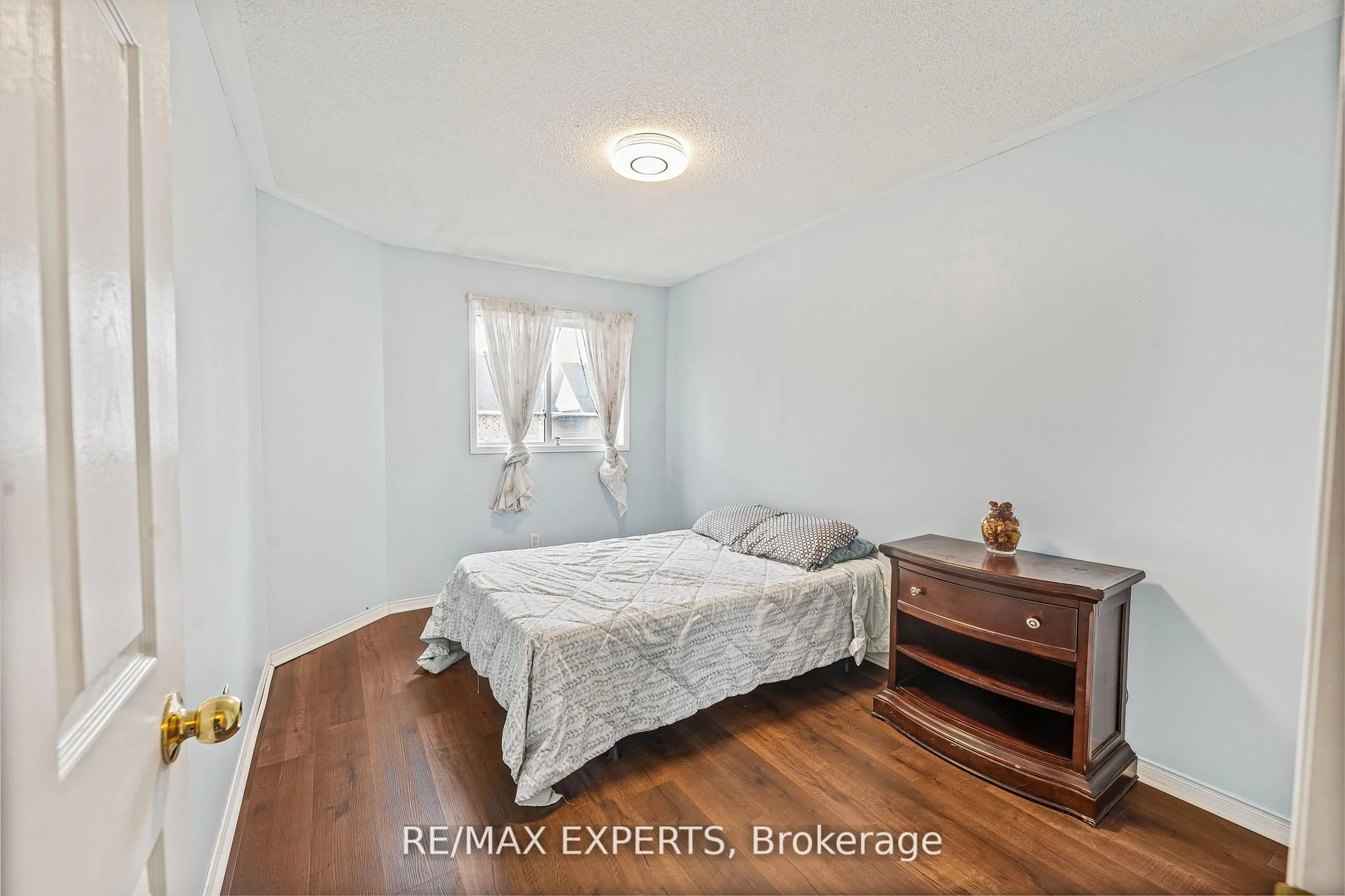 Bedroom with bed, wood/laminate floor for 129 Angier Cres, Ajax Ontario L1S 7R5
