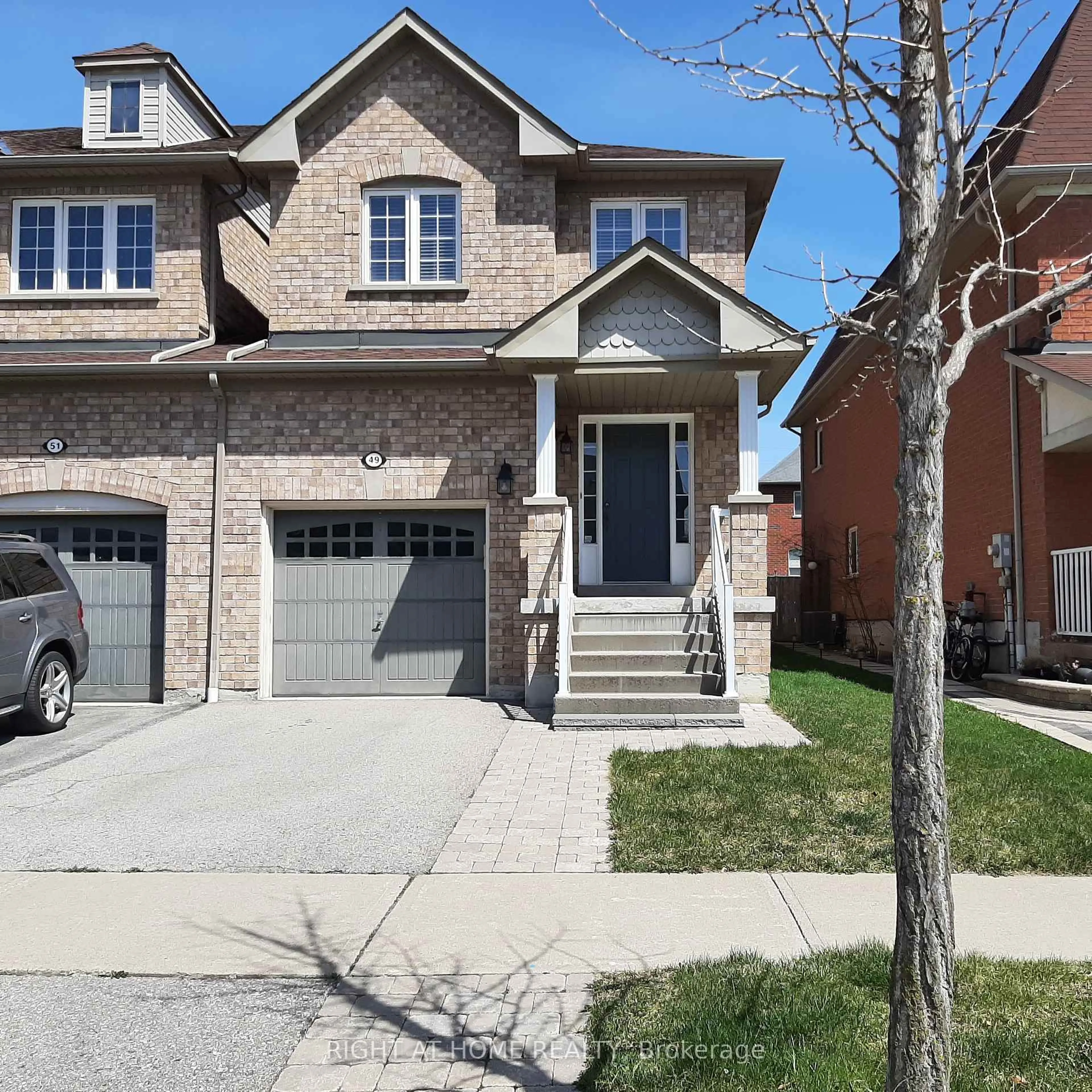 Home with brick exterior material, street for 49 Neill Ave, Whitby Ontario L1R 3N5