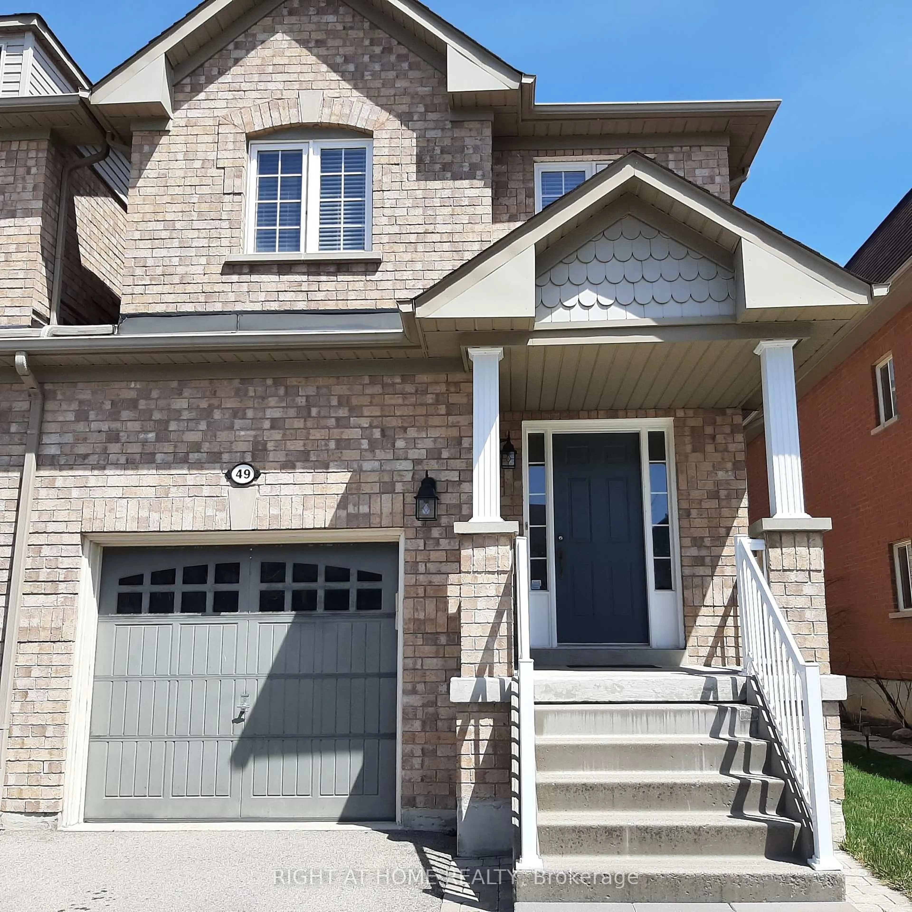 Home with brick exterior material, street for 49 Neill Ave, Whitby Ontario L1R 3N5