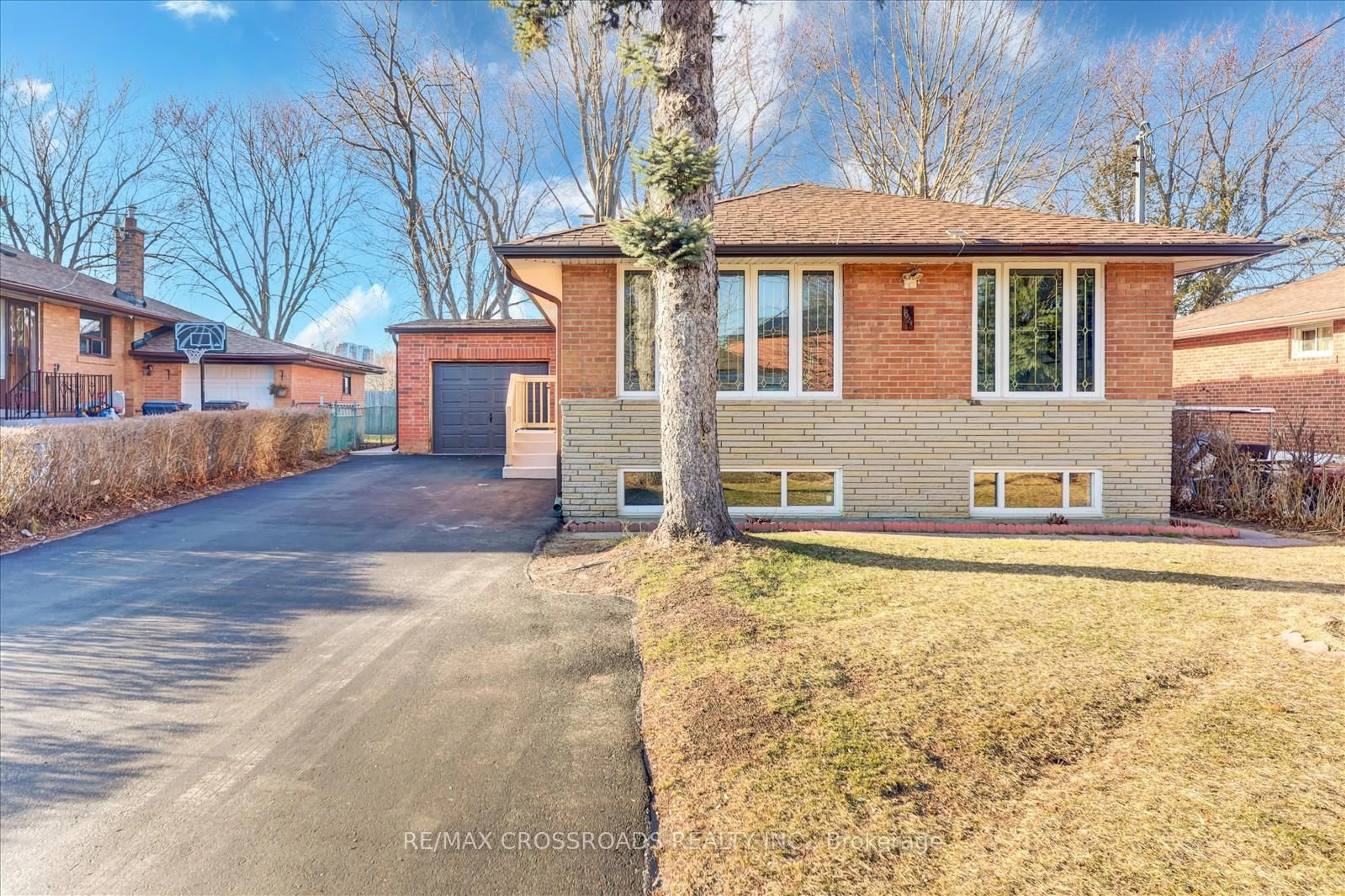 Home with brick exterior material, street for 64 Chandler Dr, Toronto Ontario M1G 1Z3