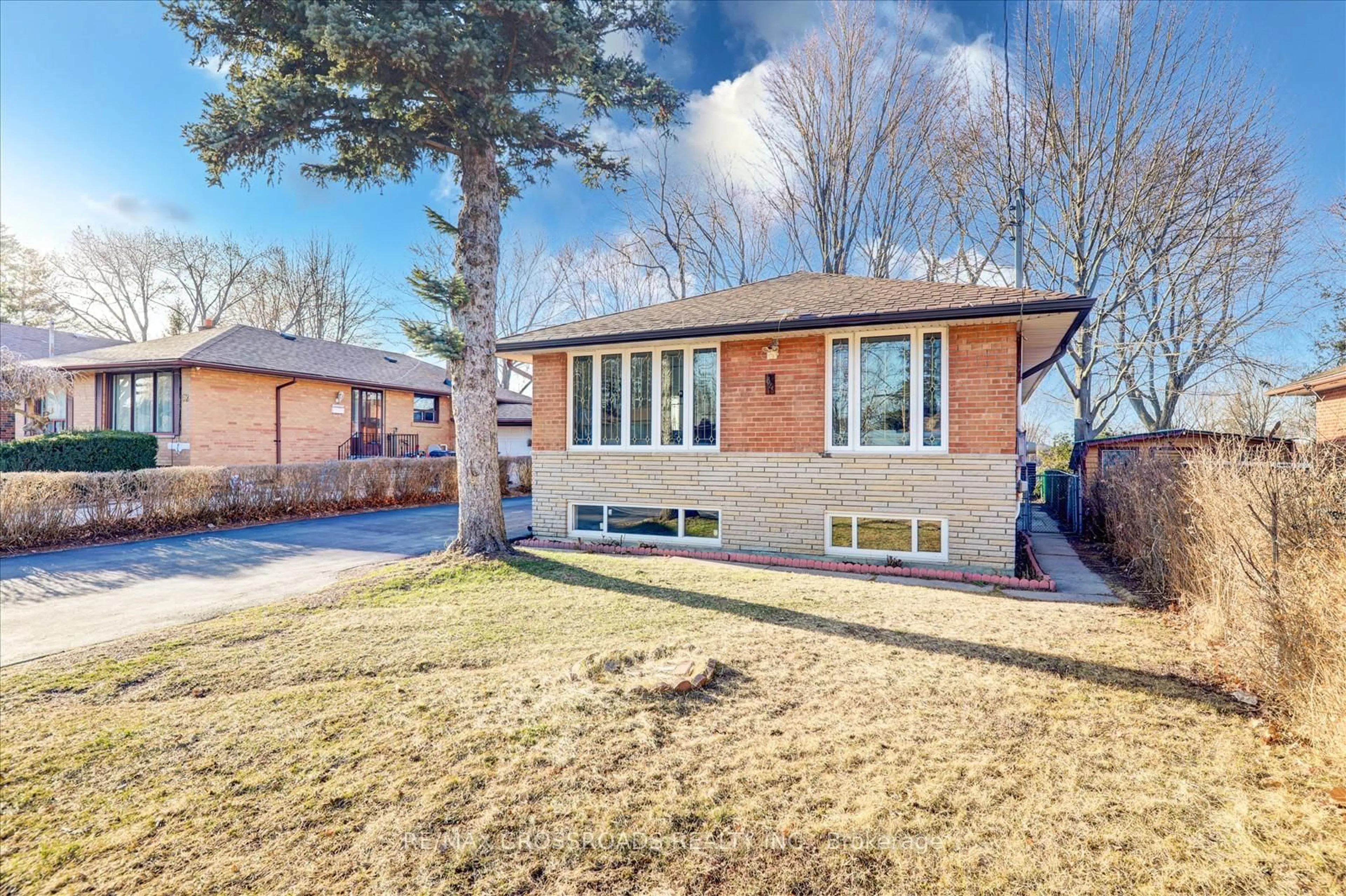 Home with brick exterior material, street for 64 Chandler Dr, Toronto Ontario M1G 1Z3