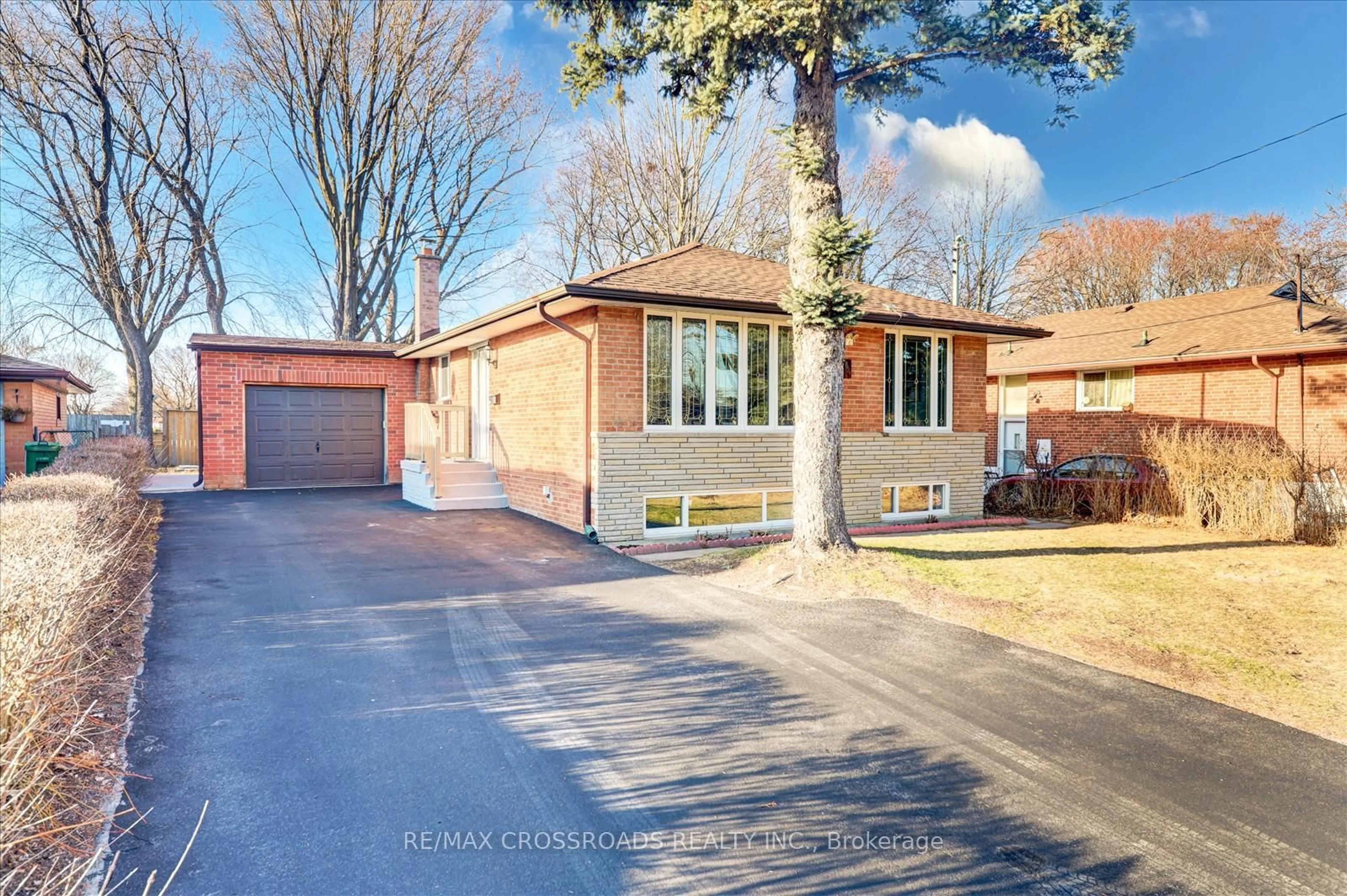 Home with brick exterior material, street for 64 Chandler Dr, Toronto Ontario M1G 1Z3