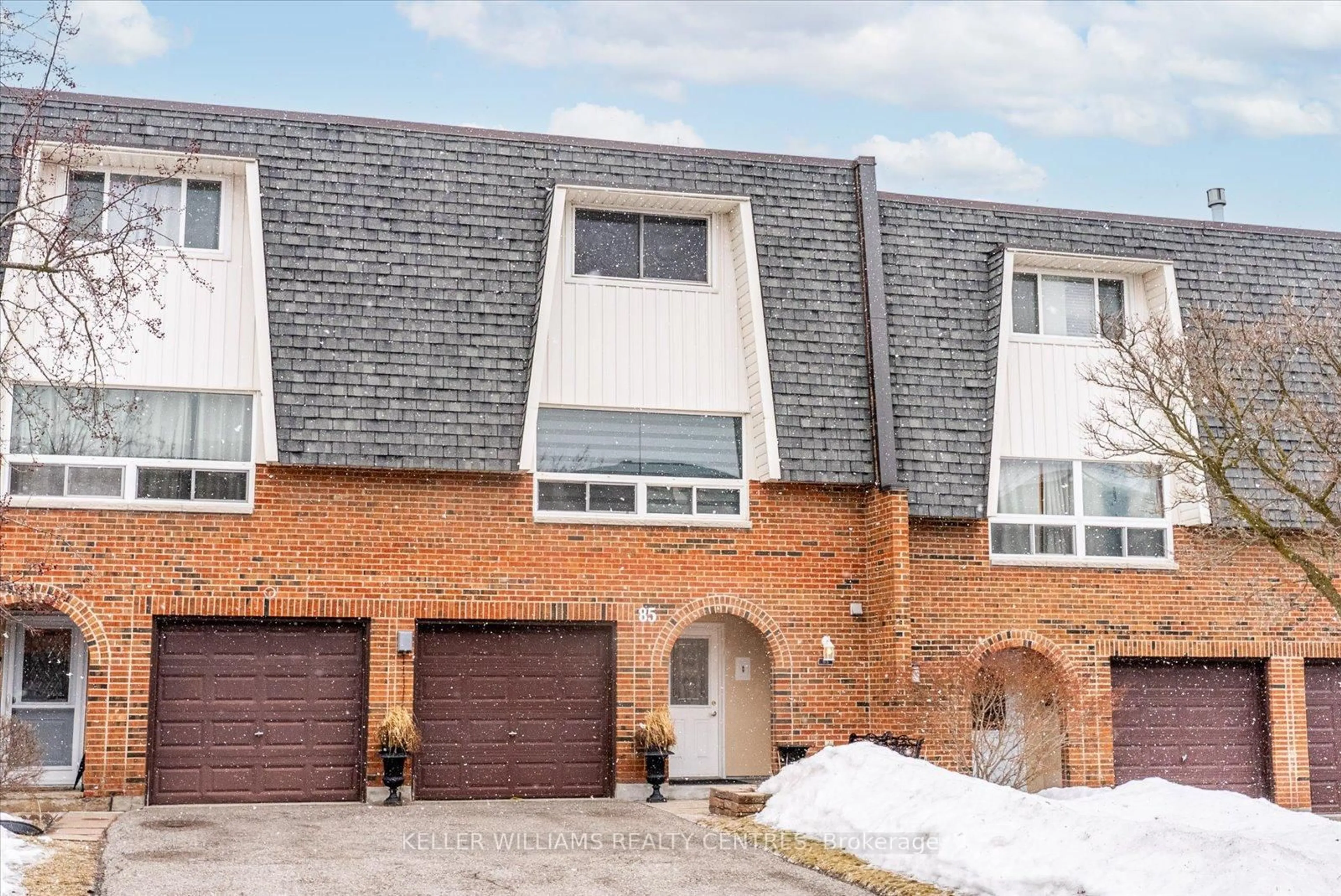 Home with brick exterior material, street for 85 Deacon Lane #85, Ajax Ontario L1S 2T4