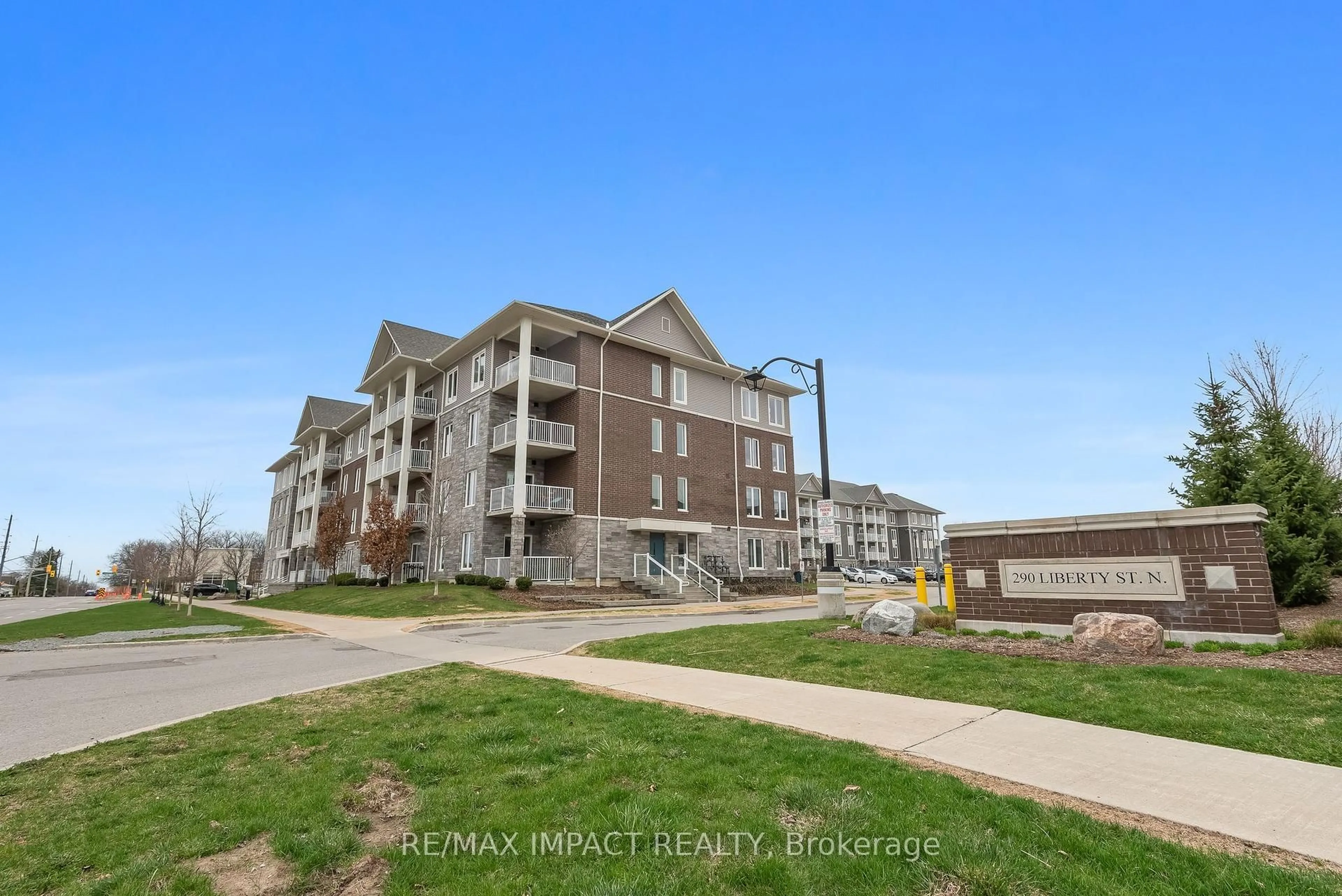 A pic from outside/outdoor area/front of a property/back of a property/a pic from drone, unknown for 290 Liberty St #305, Clarington Ontario L1C 0H3
